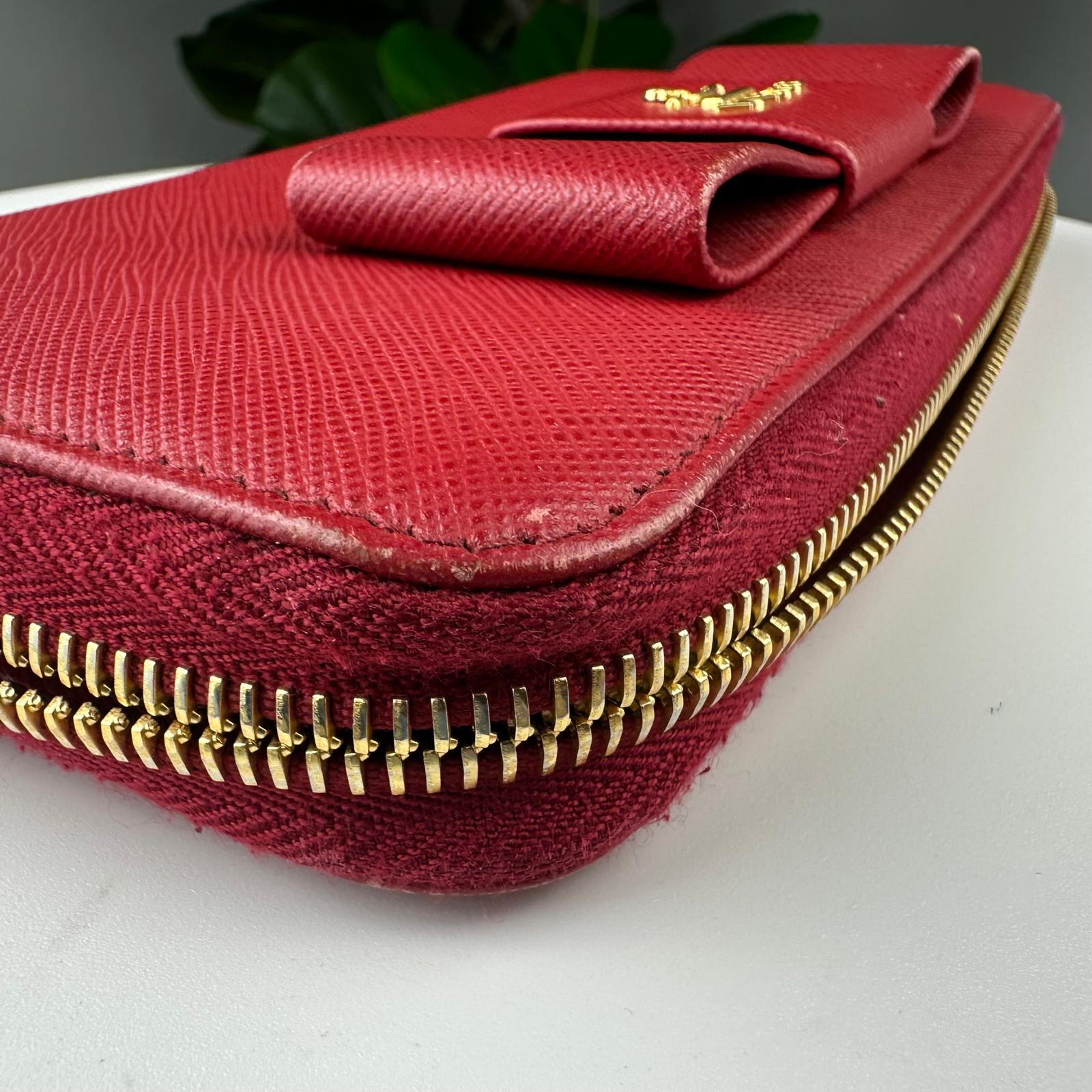 đAuthentic Prada Red Saffiano Leather Bow Zip Wallet