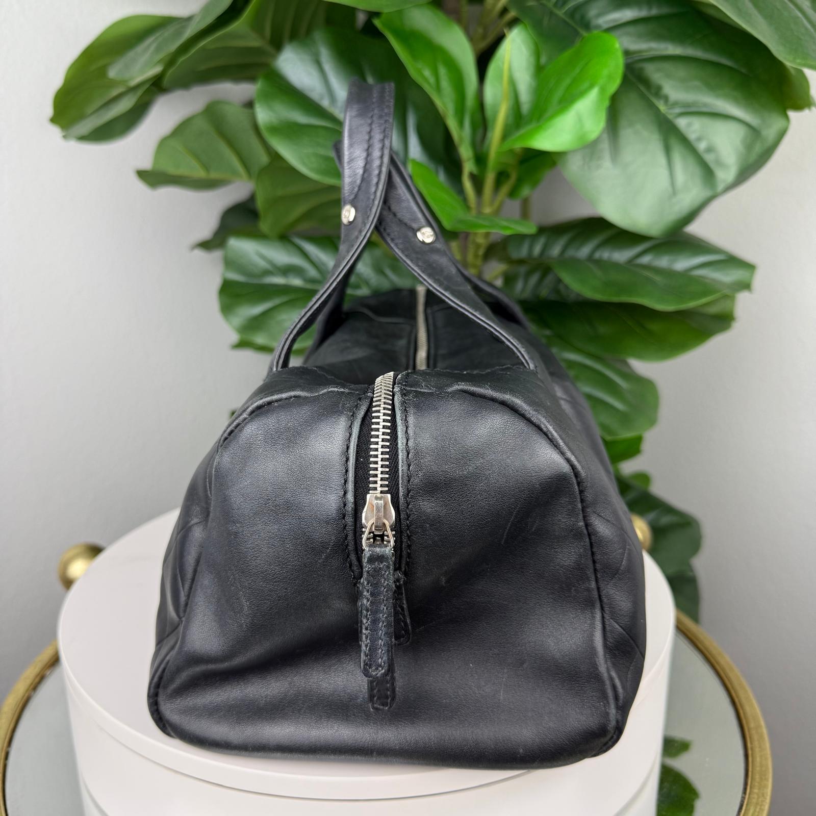 Authentic Chanel Black CC Chevron Quilted Lambskin Boston Bag