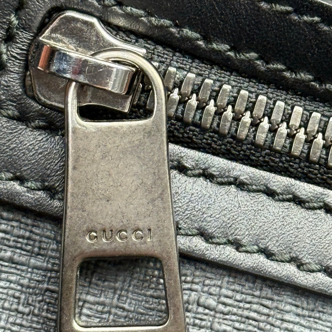 Gucci GG Coated Canvas Front Zip Flat Messenger Bag Black Medium Authentic Pre Owned