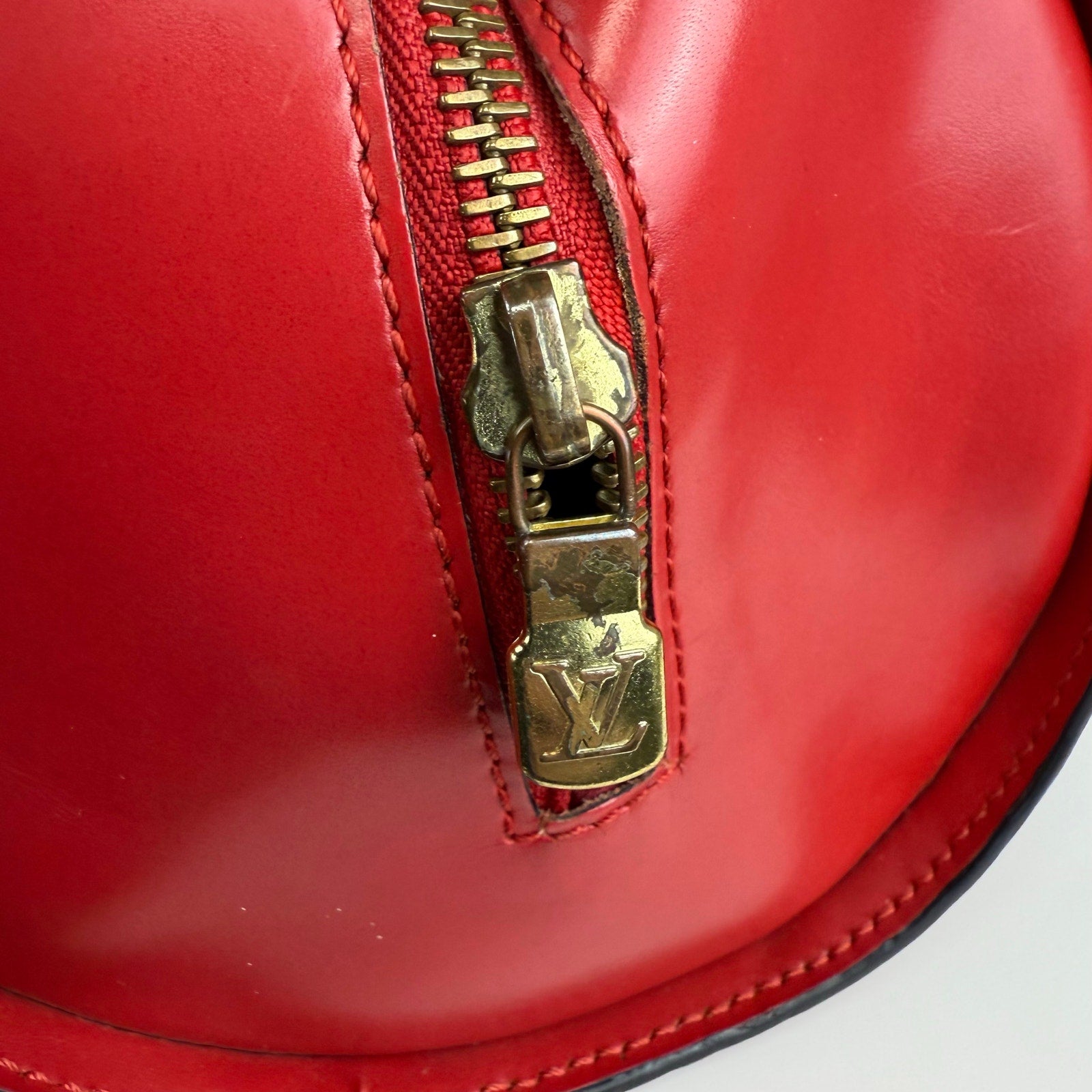 Authentic Louis Vuitton Epi Soufflot Bag Red