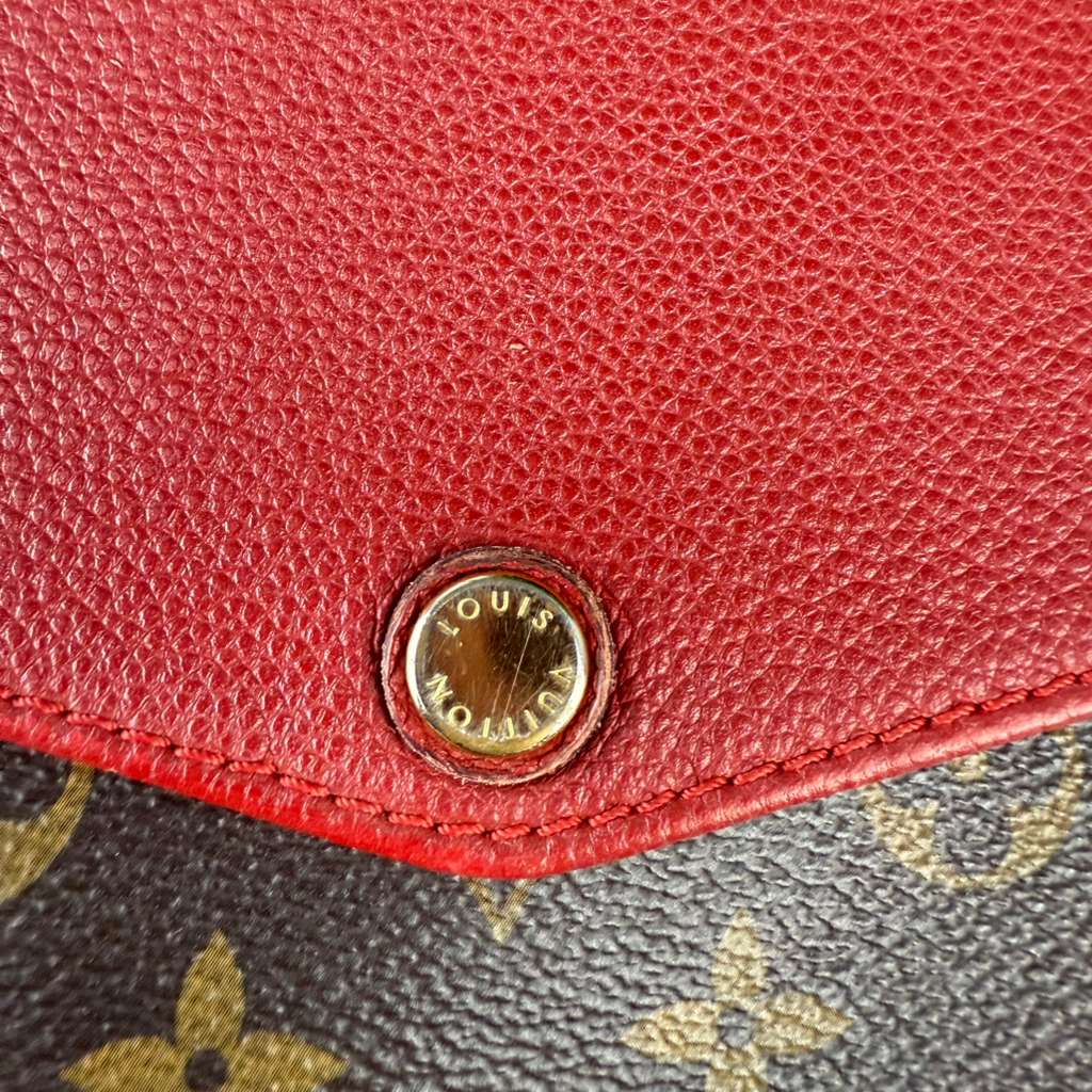 Authentic Louis Vuitton Monogram Twice Pochette bag in the Cerise Red