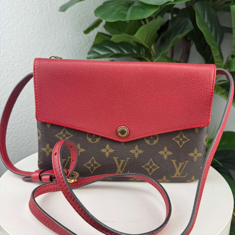 Authentic Louis Vuitton Monogram Twice Pochette bag in the Cerise Red
