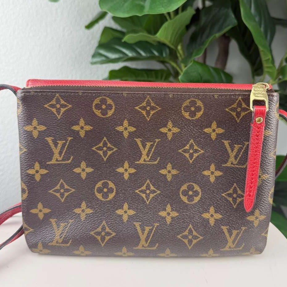 Authentic Louis Vuitton Monogram Twice Pochette bag in the Cerise Red