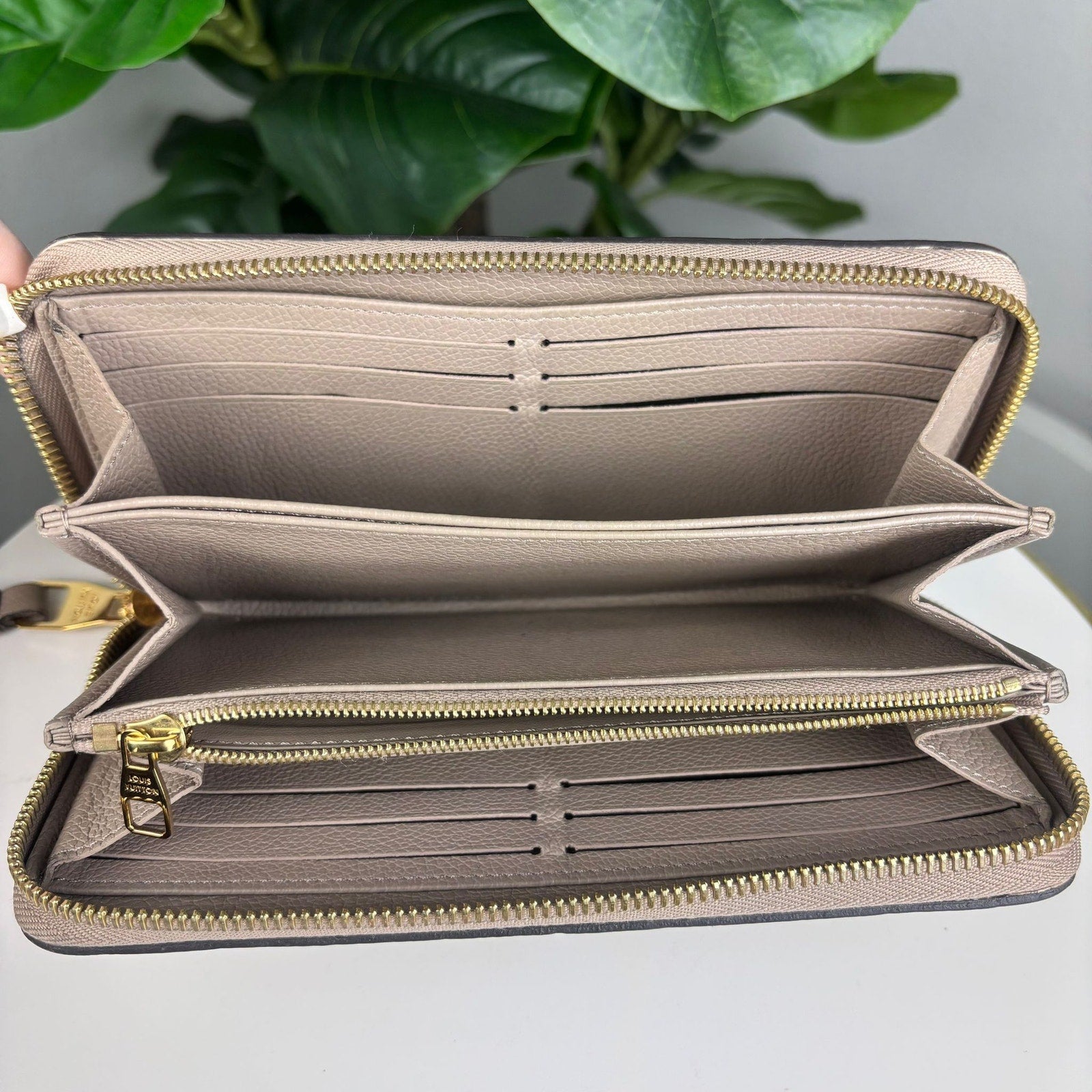 Authentic Louis Vuitton Monogram Empreinte Zippy Wallet.