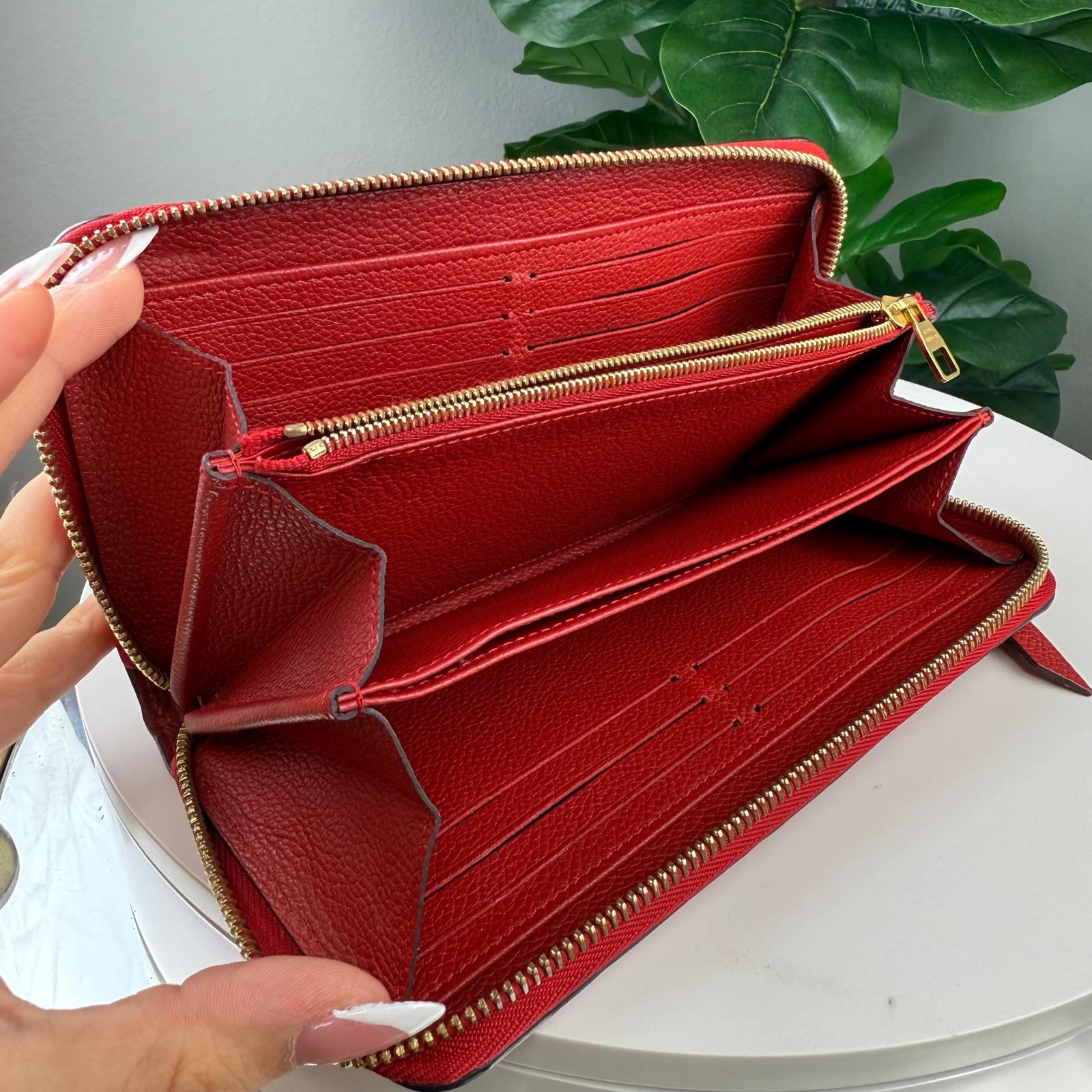 💎Authentic Louis Vuitton Zippy Wallet in red Monogram Empreinte leather