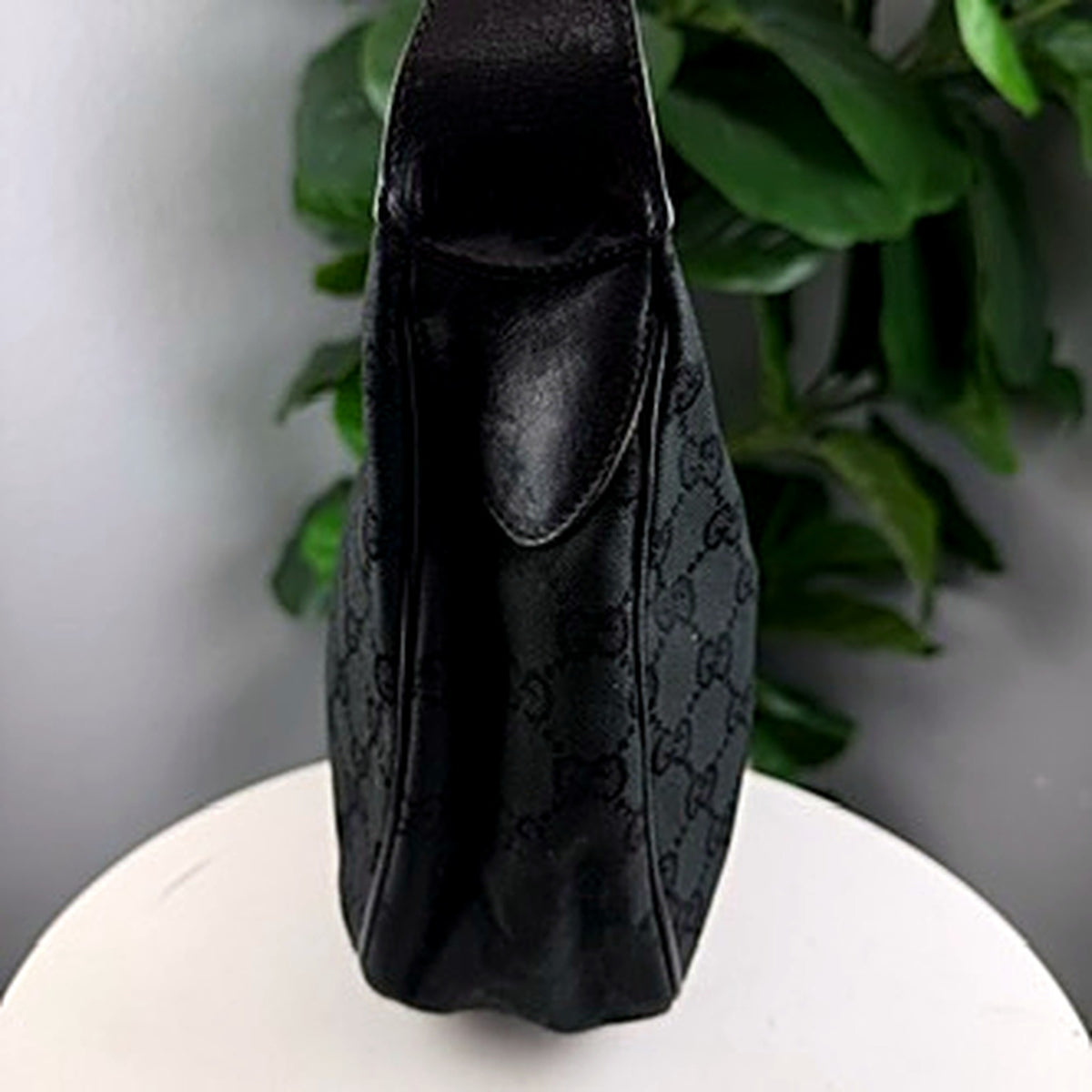 Authentic vintage Gucci Accessory Collection black GG canvas hobo bag - side view