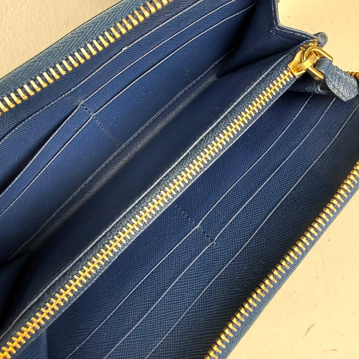 Authentic Prada Saffiano Leather Zip Around Wallet in Blue - 05_inside.jpg
