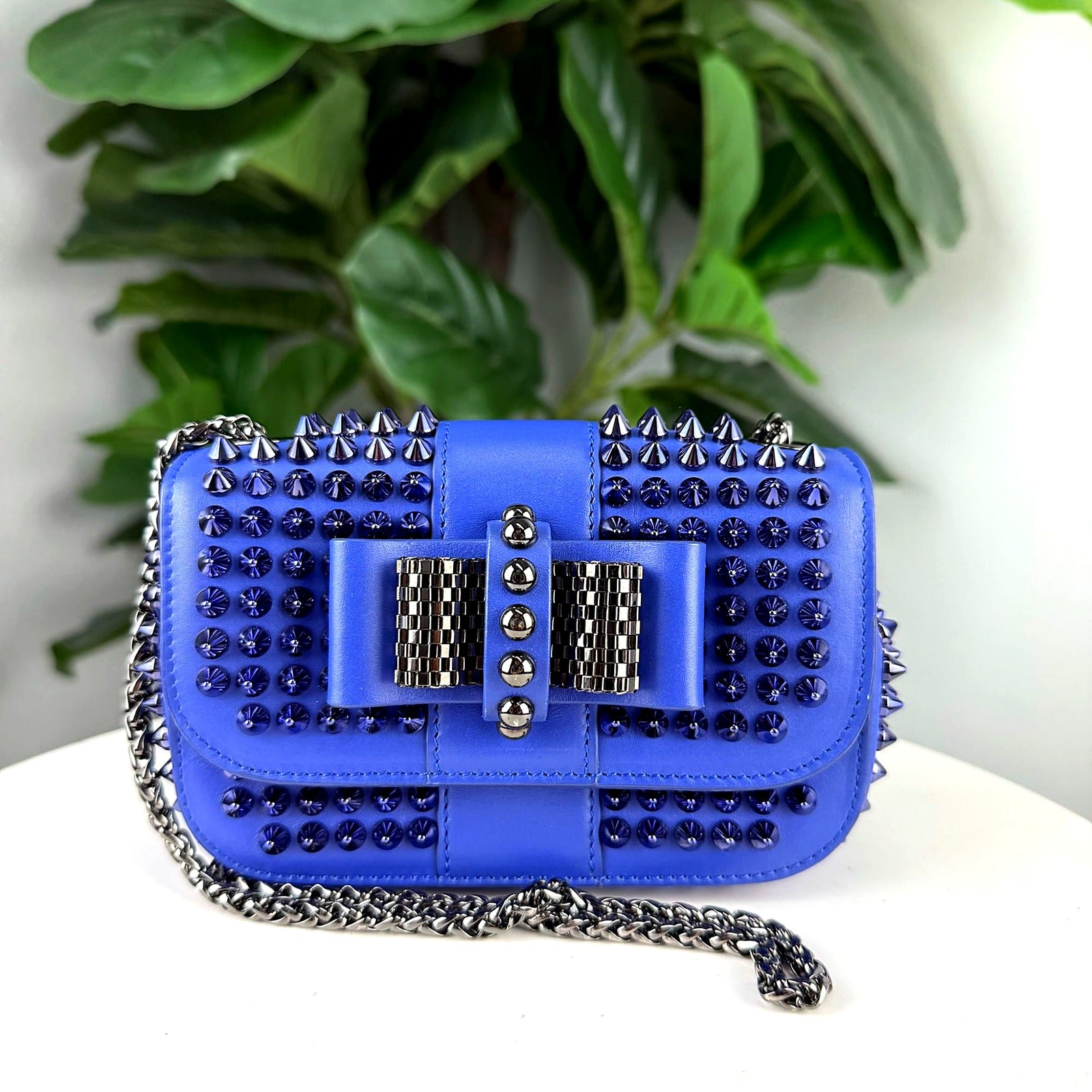 Authentic Christian Louboutin Sweet Charity blue spiked crossbody bag - front view