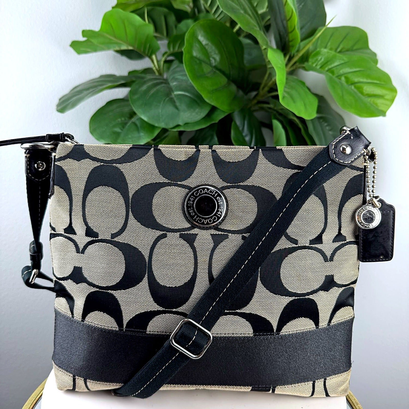 Authentic Coach black tan signature jacquard crossbody swingpack bag front view