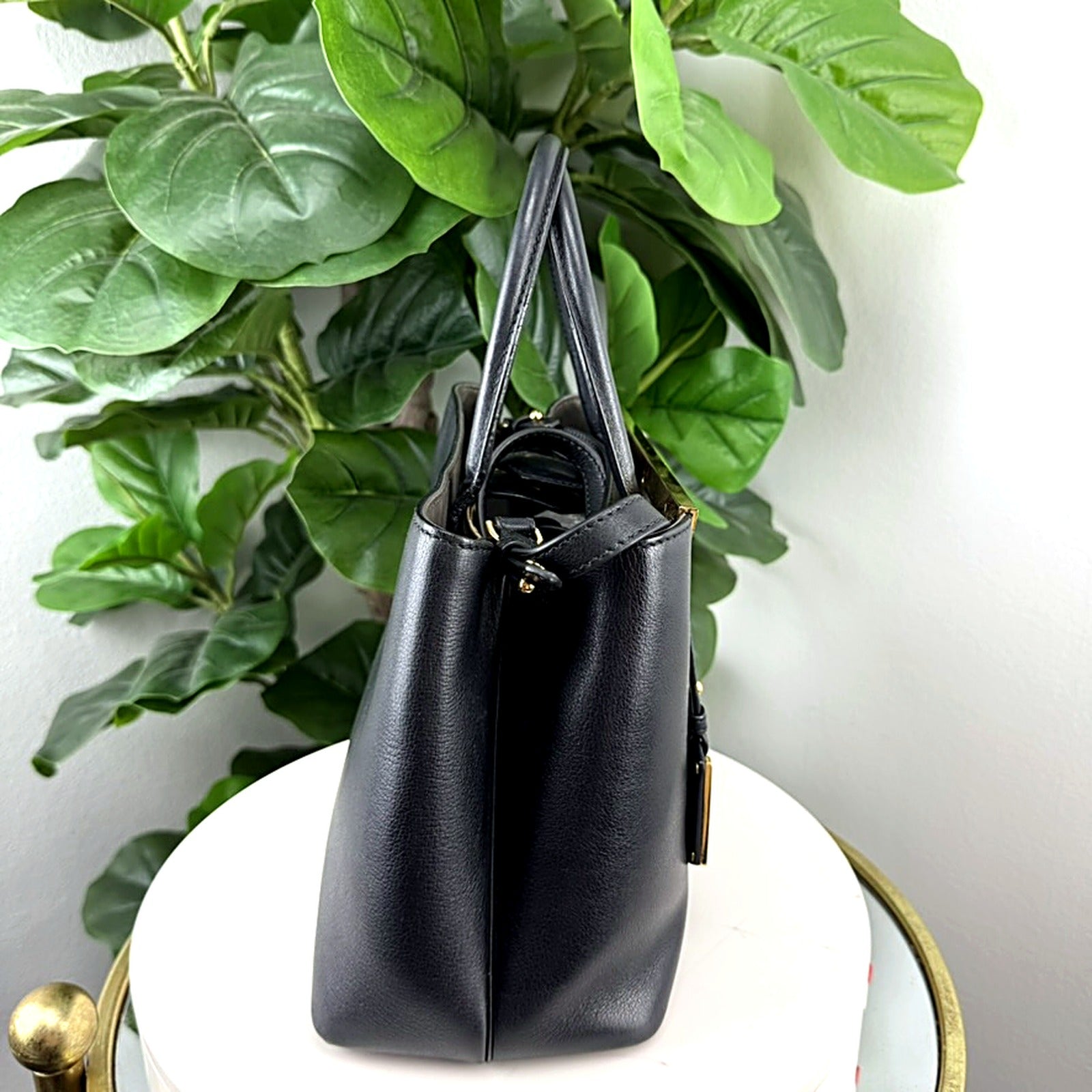 Authentic Fendi 2Jours Petite black leather tote bag - side profile view showing boxy tapered silhouette