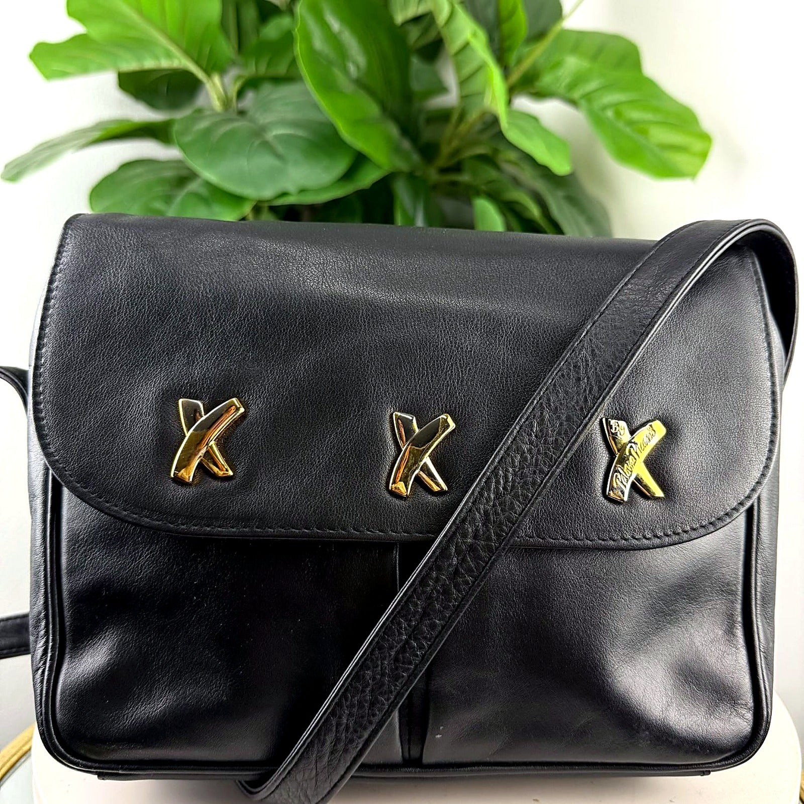 Authentic Paloma Picasso black leather X hardware crossbody bag - front