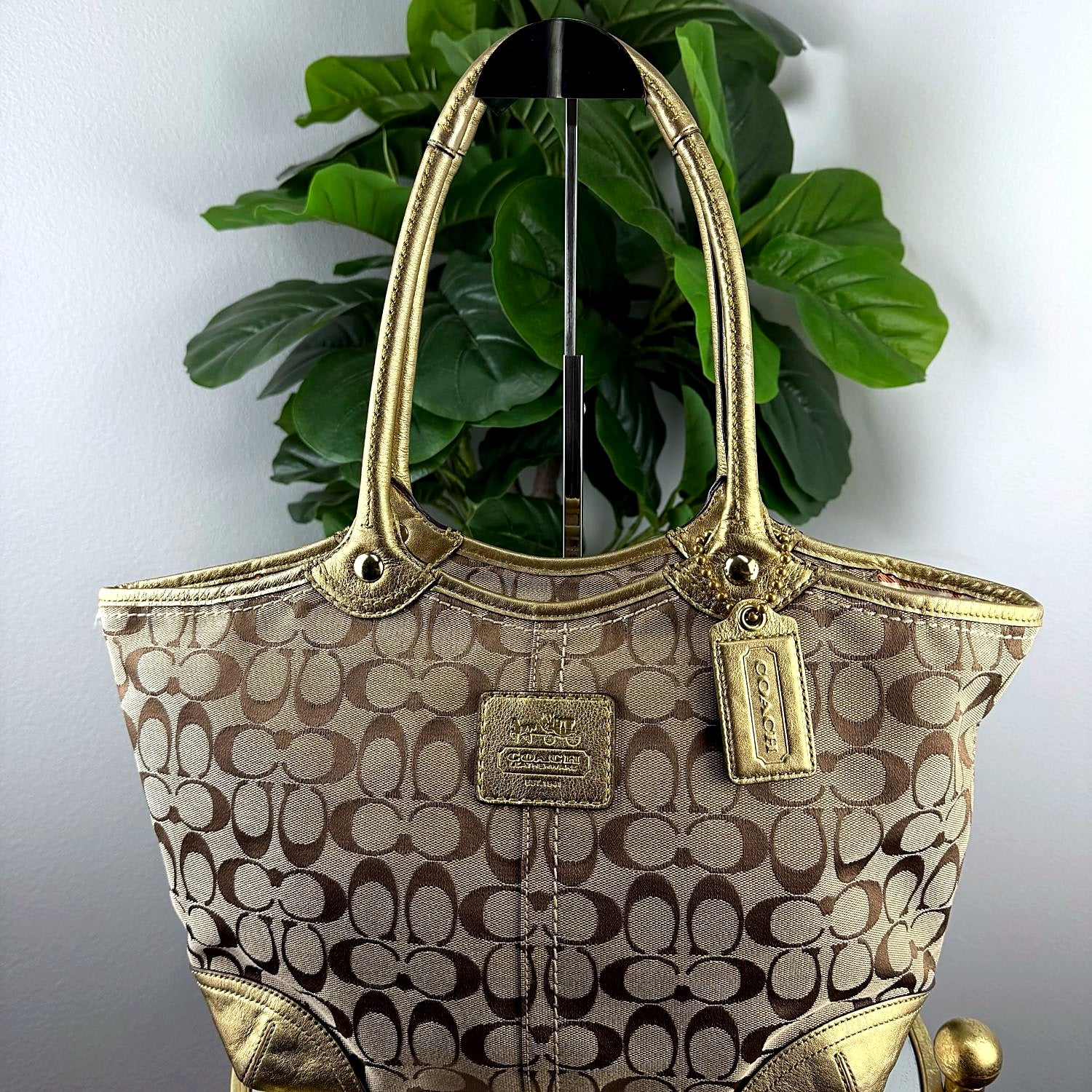 Authentic Coach gold Signature canvas tote bag, front view