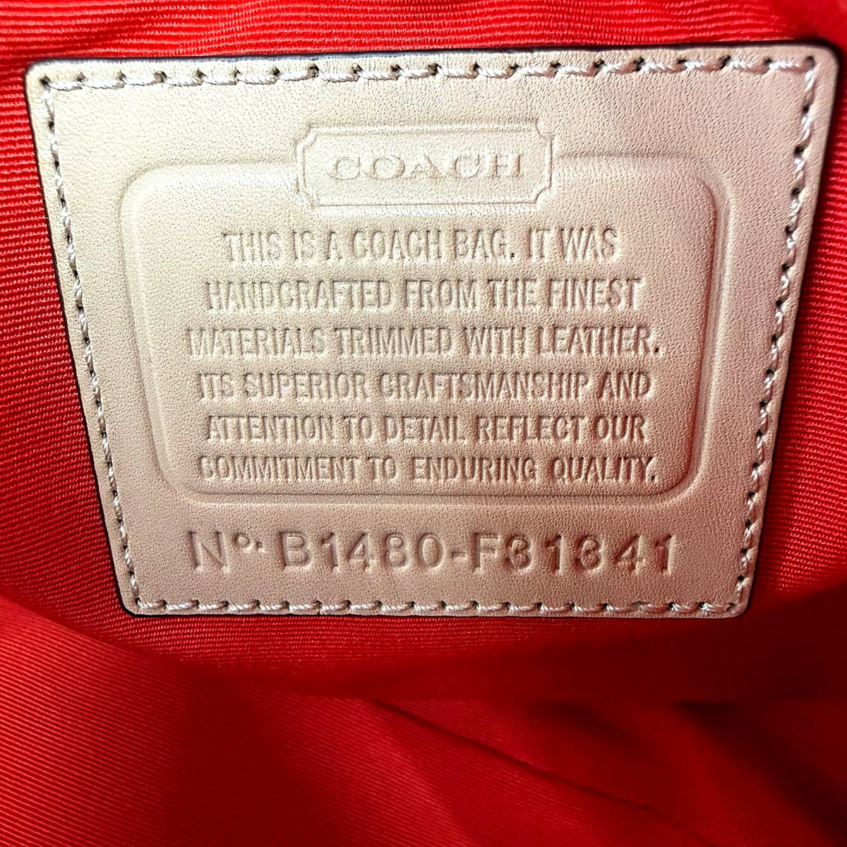 Coach interior leather patch stamped N B1480-F31641 authenticity serial