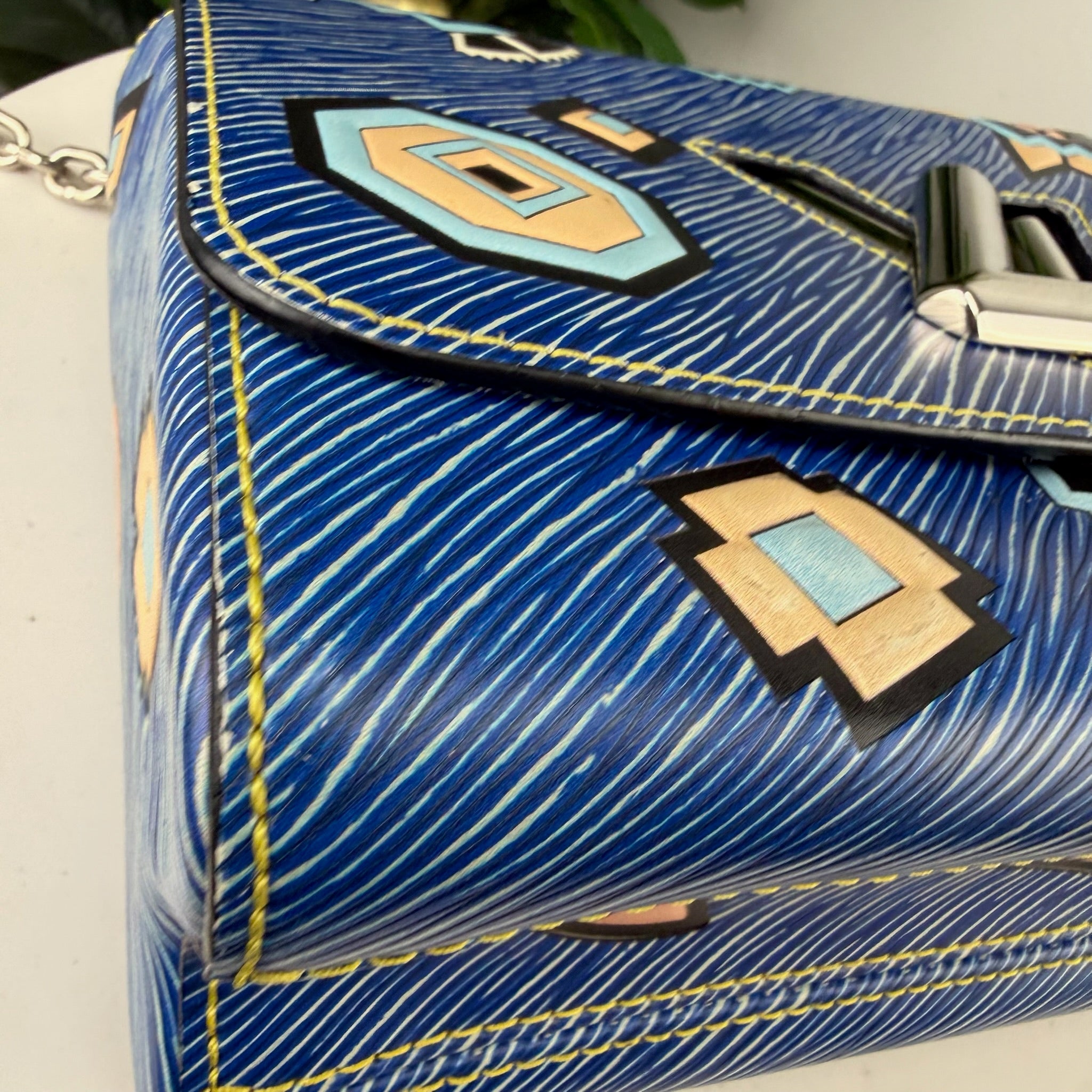 Authentic Louis Vuitton Blue Denim Aztec Epi Leather Twist Bag