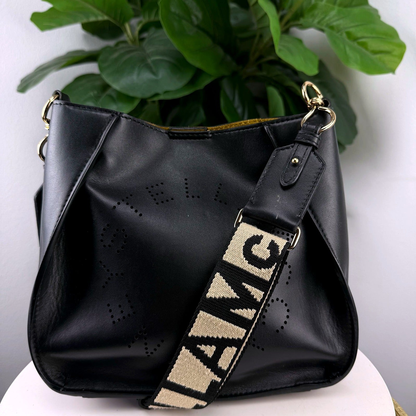 Authentic Stella McCartney Black Perforated Logo Crossbody Bag - front