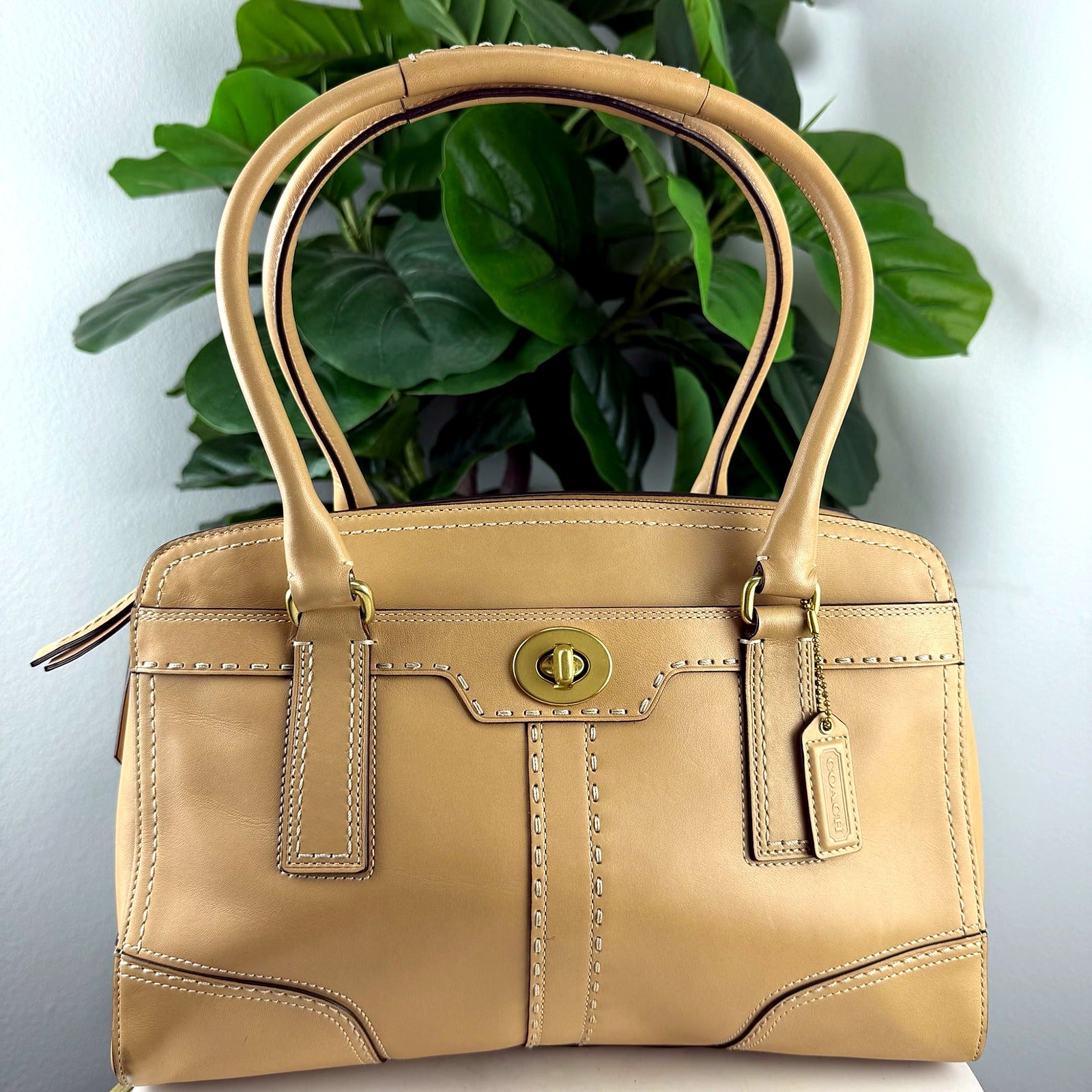 Authentic Coach tan leather turnlock satchel bag - front view
