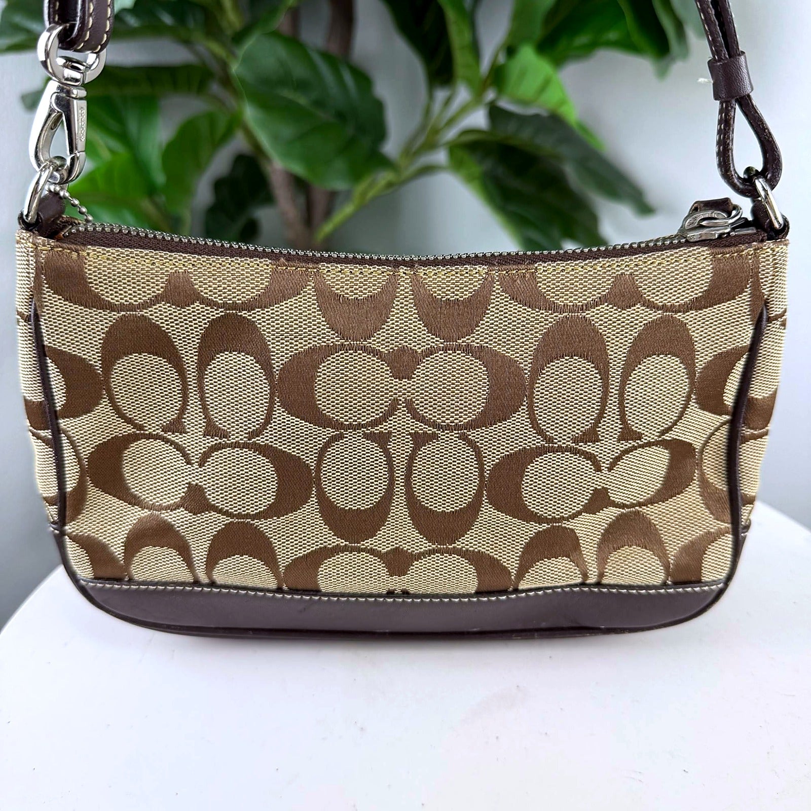 Authentic Coach tan Signature canvas pouch shoulder bag, front view