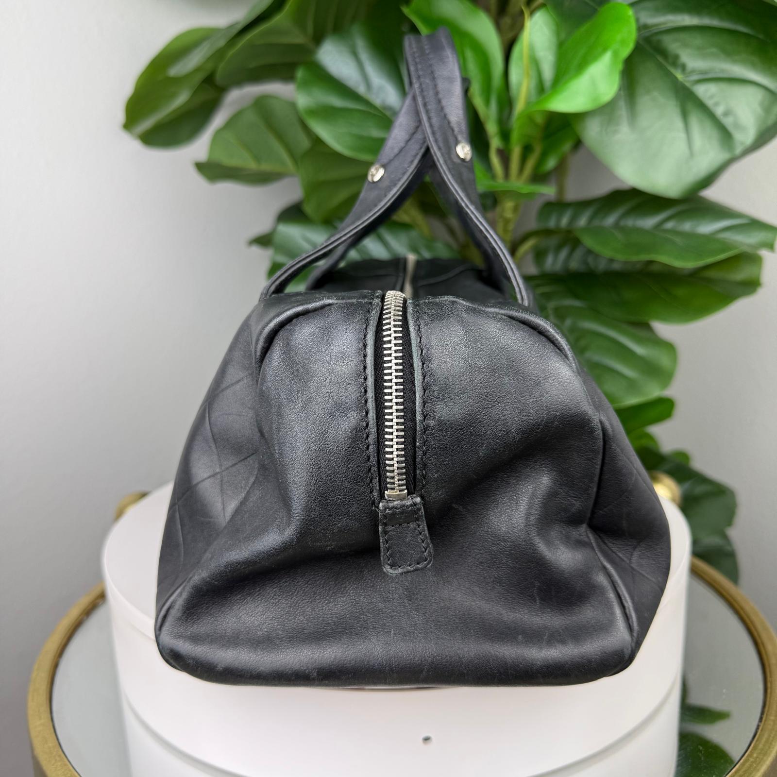 Authentic Chanel Black CC Chevron Quilted Lambskin Boston Bag