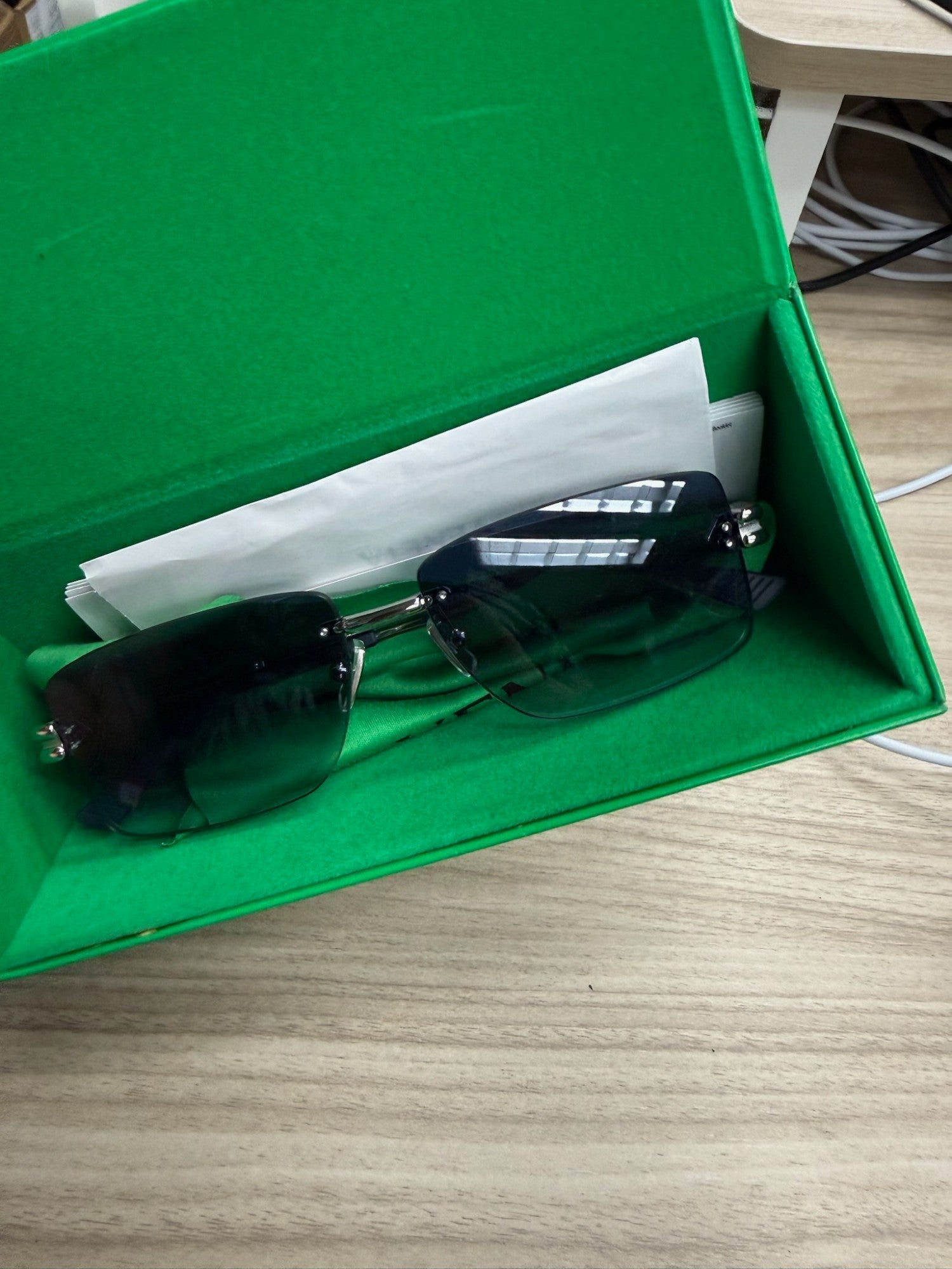 Bottega Veneta rimless rectangular sunglasses with green gradient lenses in signature green case