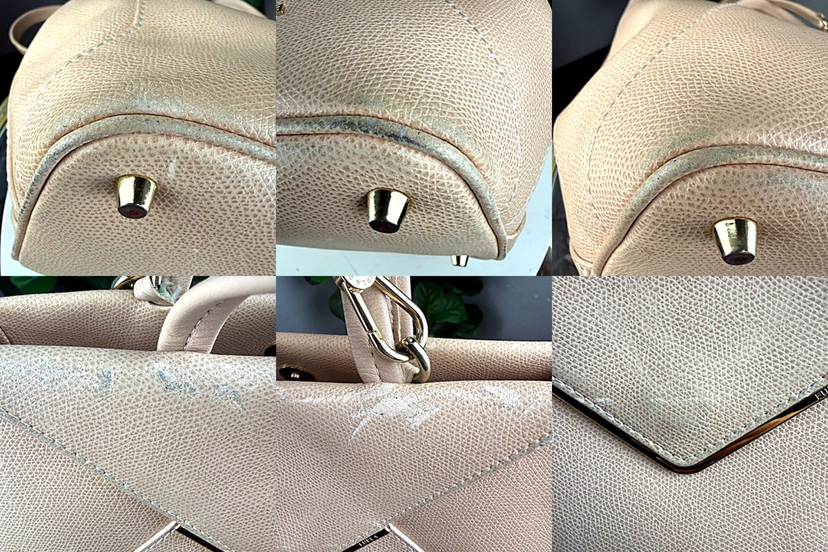Furla tote corner wear detail, flap and clasp hardware detail, trim edge detail