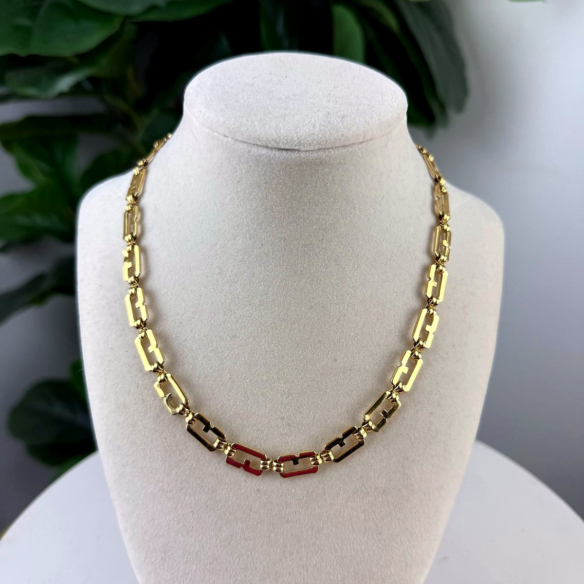 Vintage Gold-Tone Fancy Link Necklace with Red Enamel Accents worn on bust form