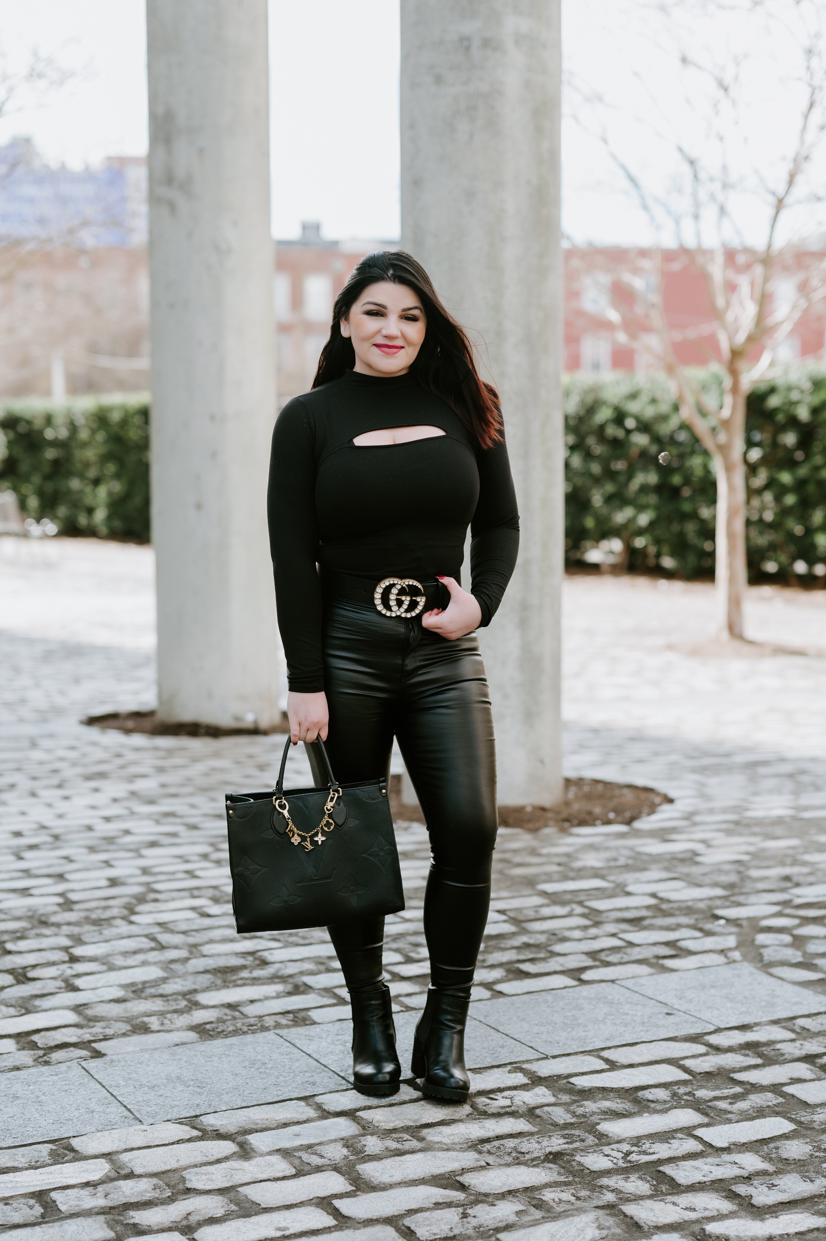 Sasha wearing a Gucci GG belt