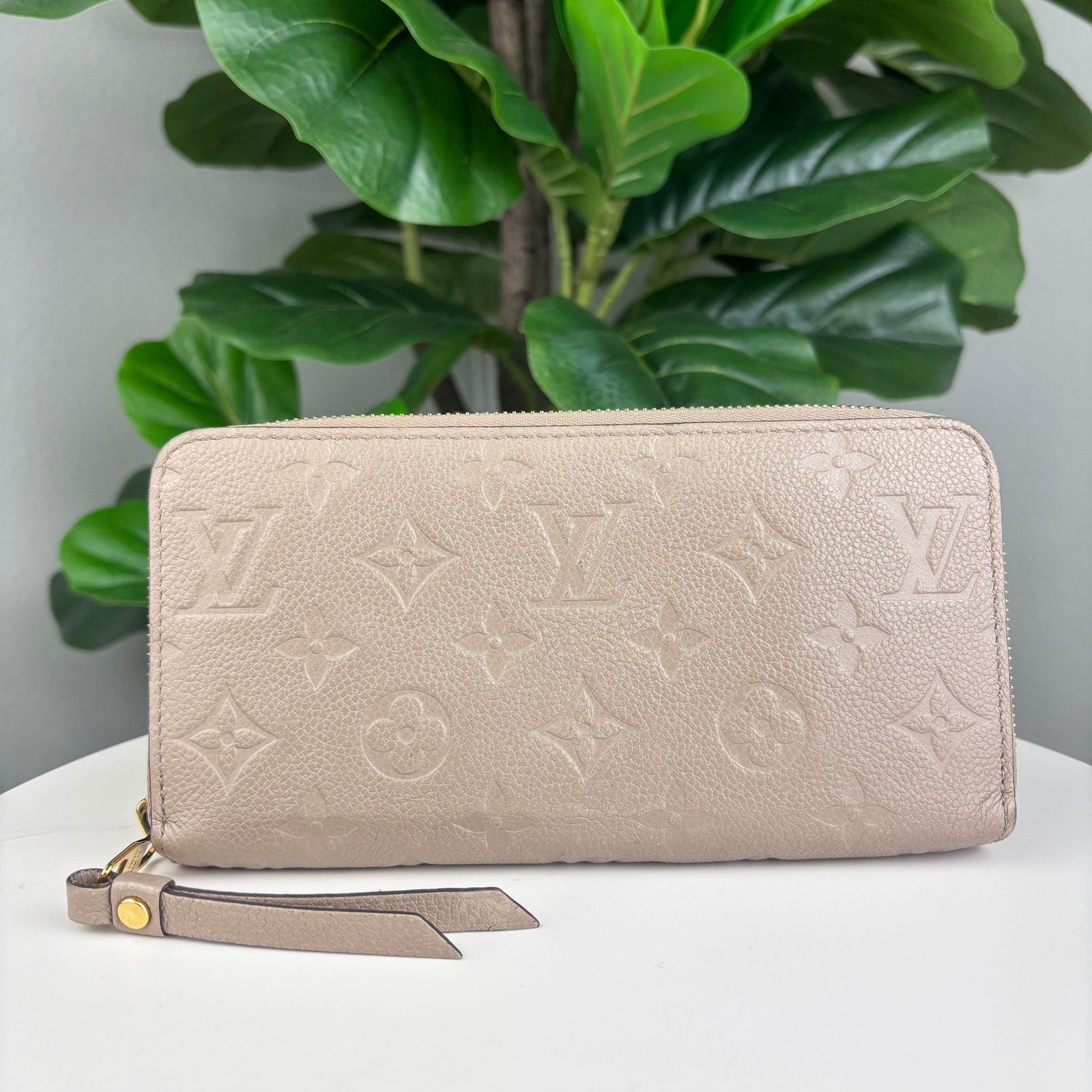 Authentic Louis Vuitton Monogram Empreinte Zippy Wallet.