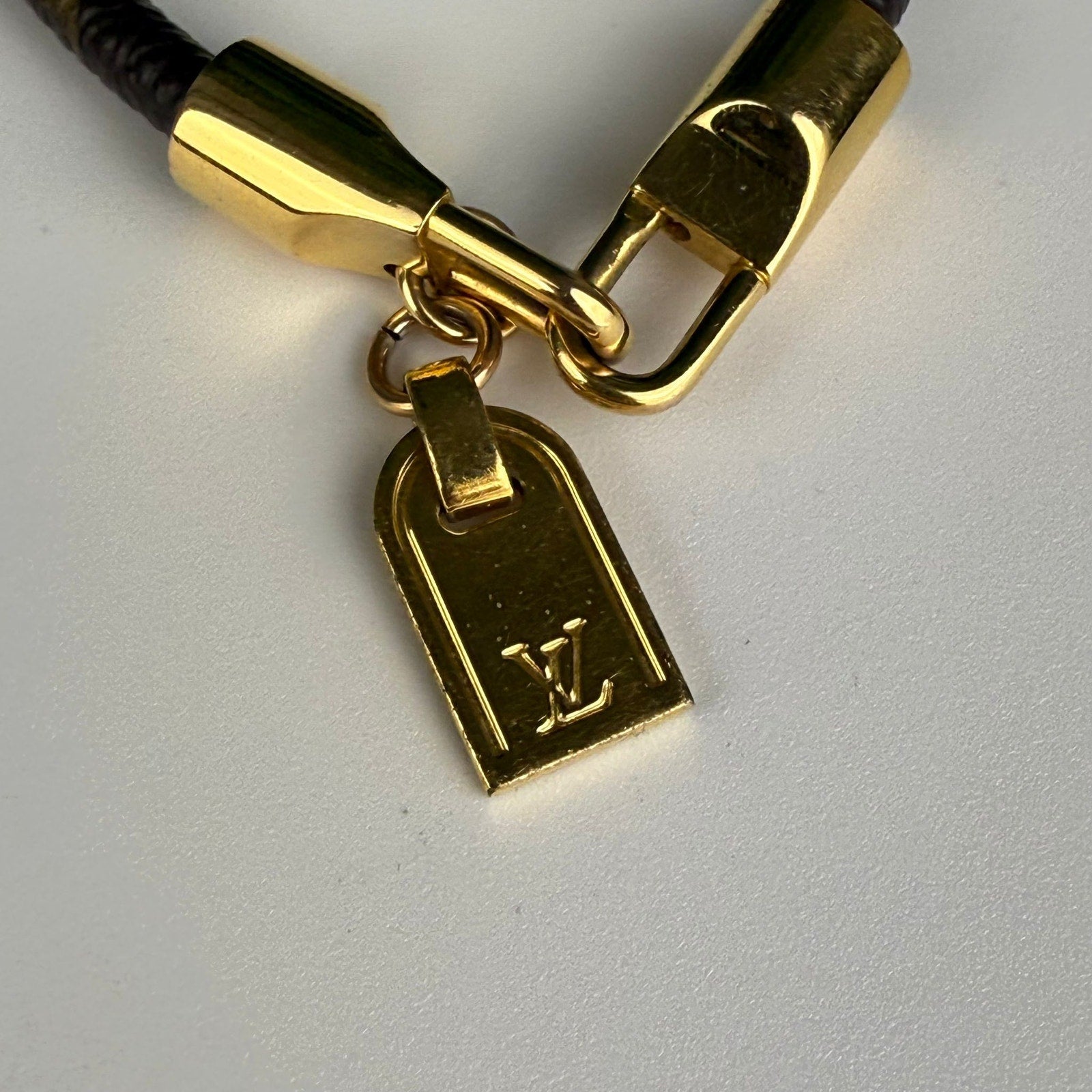 Authentic Louis Vuitton Gold Tone Monogram Canvas Luck It Bracelet 6.5"
