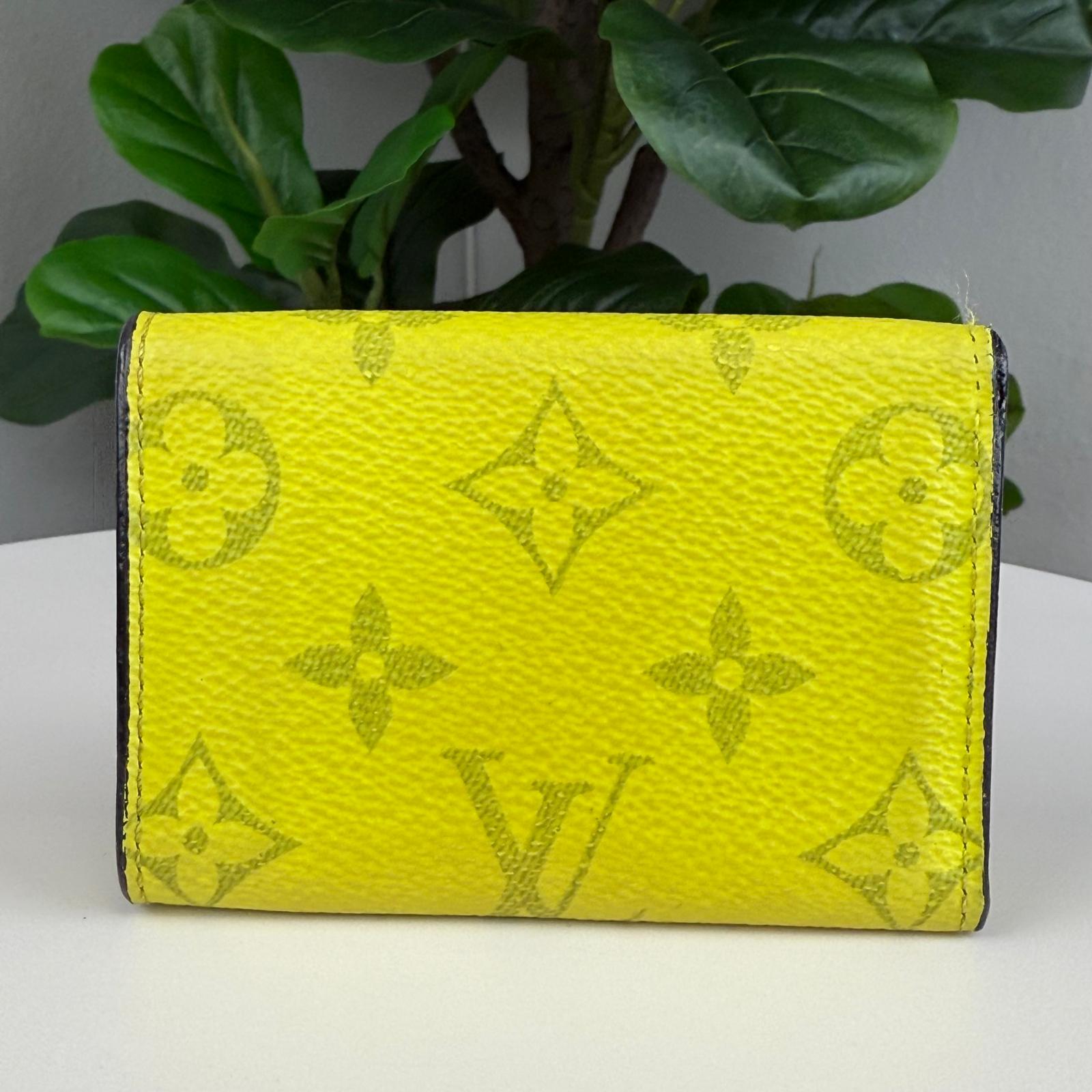 Authentic Louis Vuitton Monogram Discovery Compact Wallet Yellow