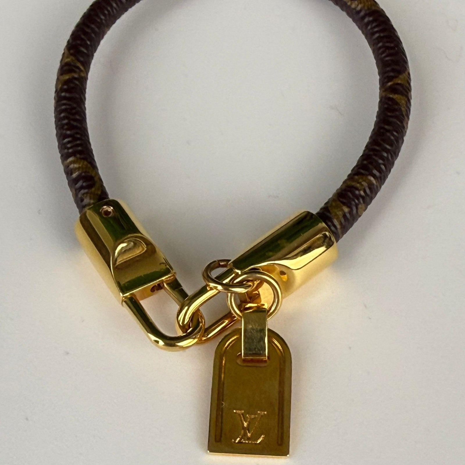 Authentic Louis Vuitton Gold Tone Monogram Canvas Luck It Bracelet 5.75"