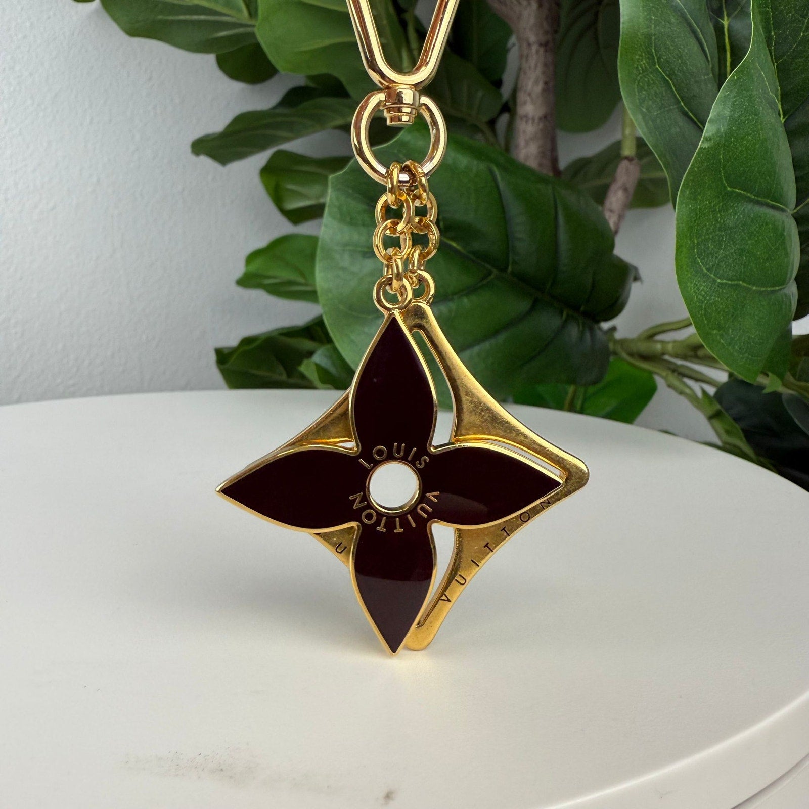 Authentic Louis Vuitton Black and Gold Puzzle Key Charm