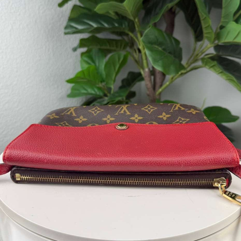Authentic Louis Vuitton Monogram Twice Pochette bag in the Cerise Red