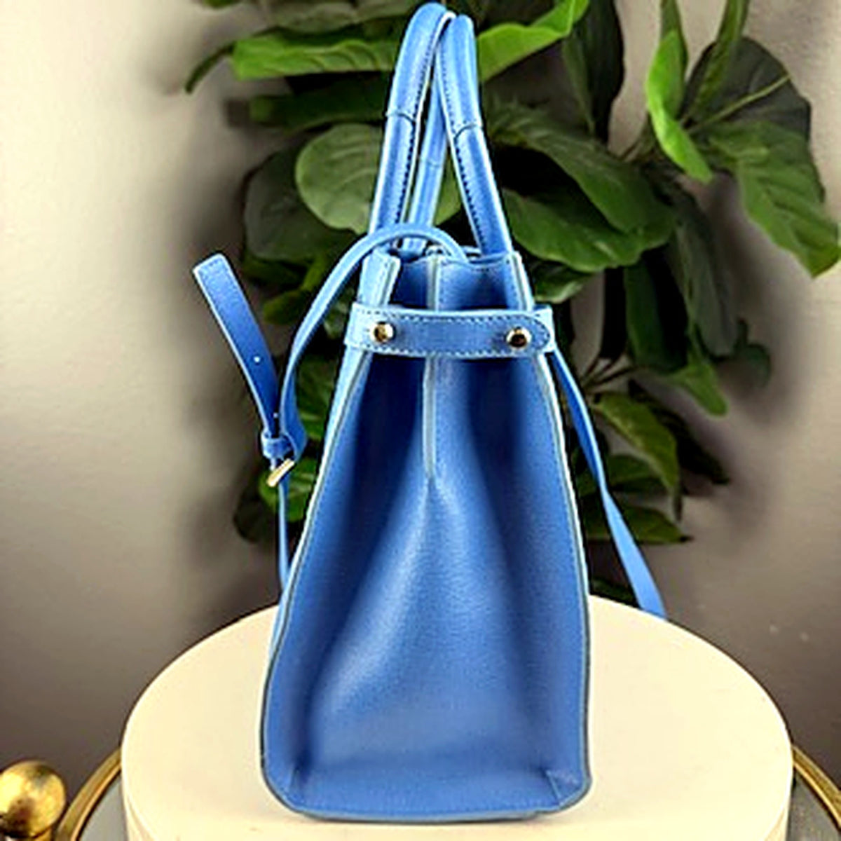 Authentic Furla powder blue saffiano leather tote bag, side view with crossbody strap