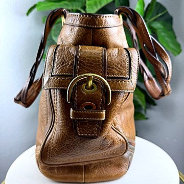 Authentic Coach camel pebbled leather crossbody tote - buckle flap and crossbody strap detail