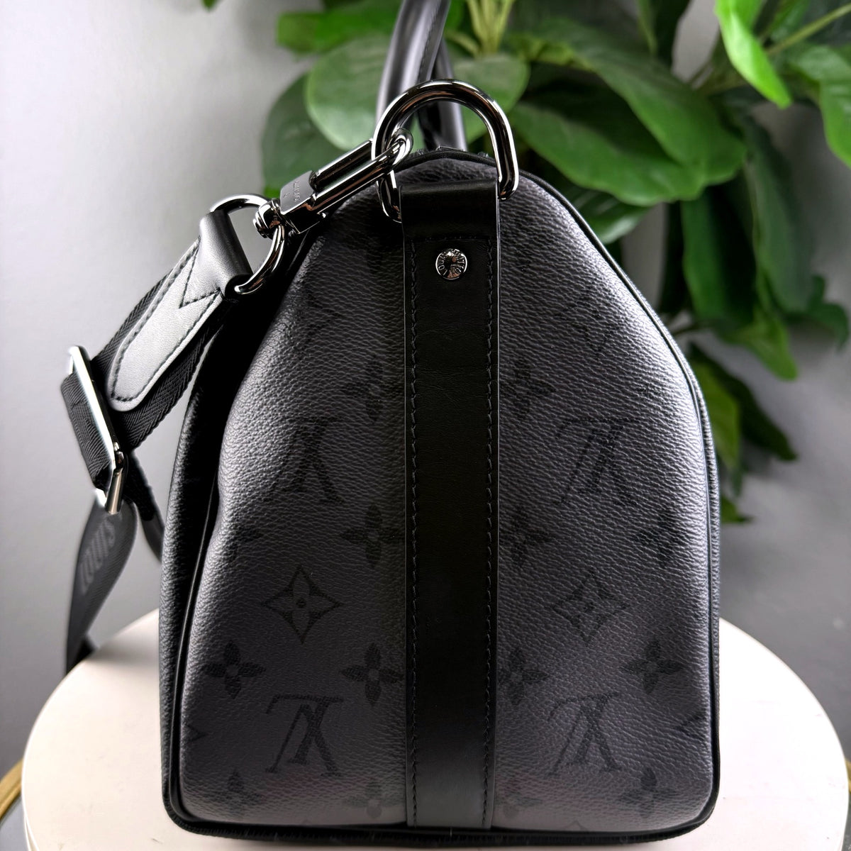 Authentic Louis Vuitton Keepall Bandoulière 45 Monogram Eclipse Canvas Duffle - 05_leftover_single.jpg