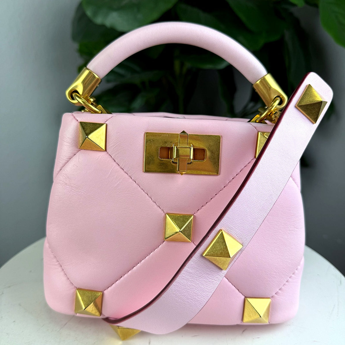 Authentic Valentino Garavani Roman Stud Small Top Handle Bag in Pink Leather - 01_photo.jpg