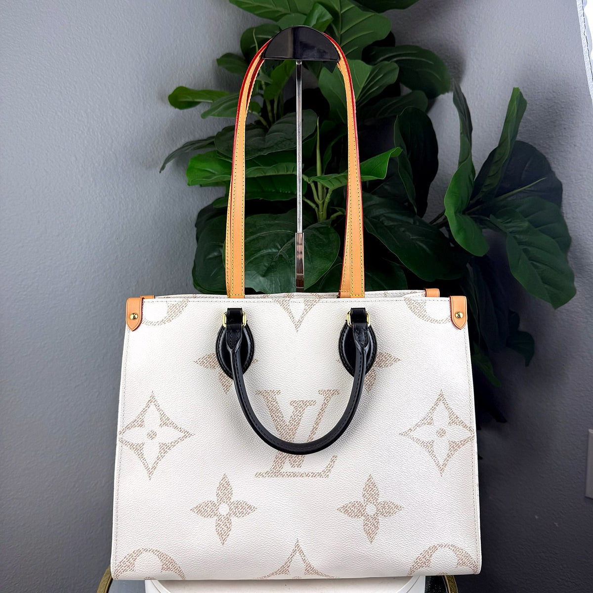 Authentic Louis Vuitton OnTheGo MM Monogram Empreinte Cream Tote Bag - 01_photo.jpg