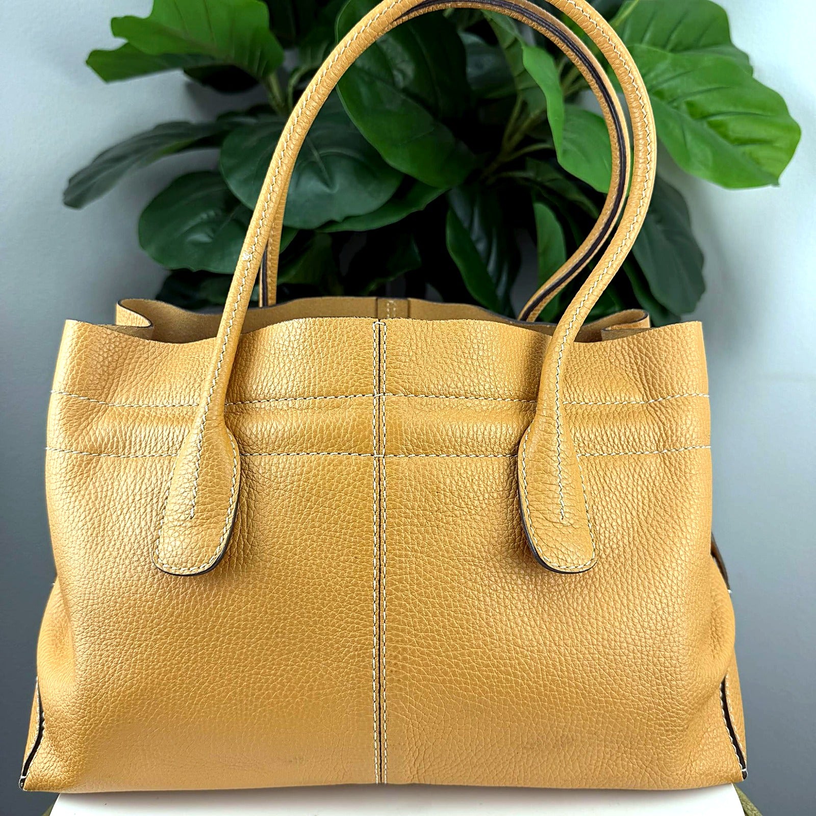 Tod's tan pebbled leather tote back
