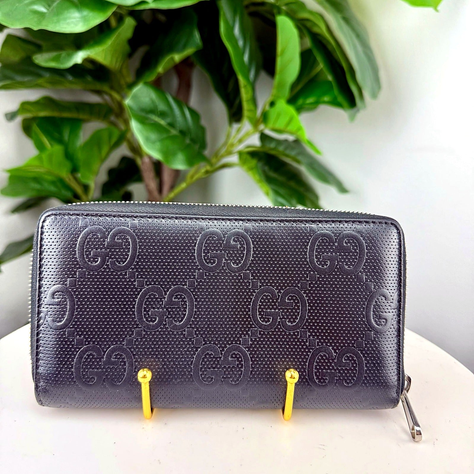 Authentic Gucci GG Embossed Monogram Leather Zip Wallet - front