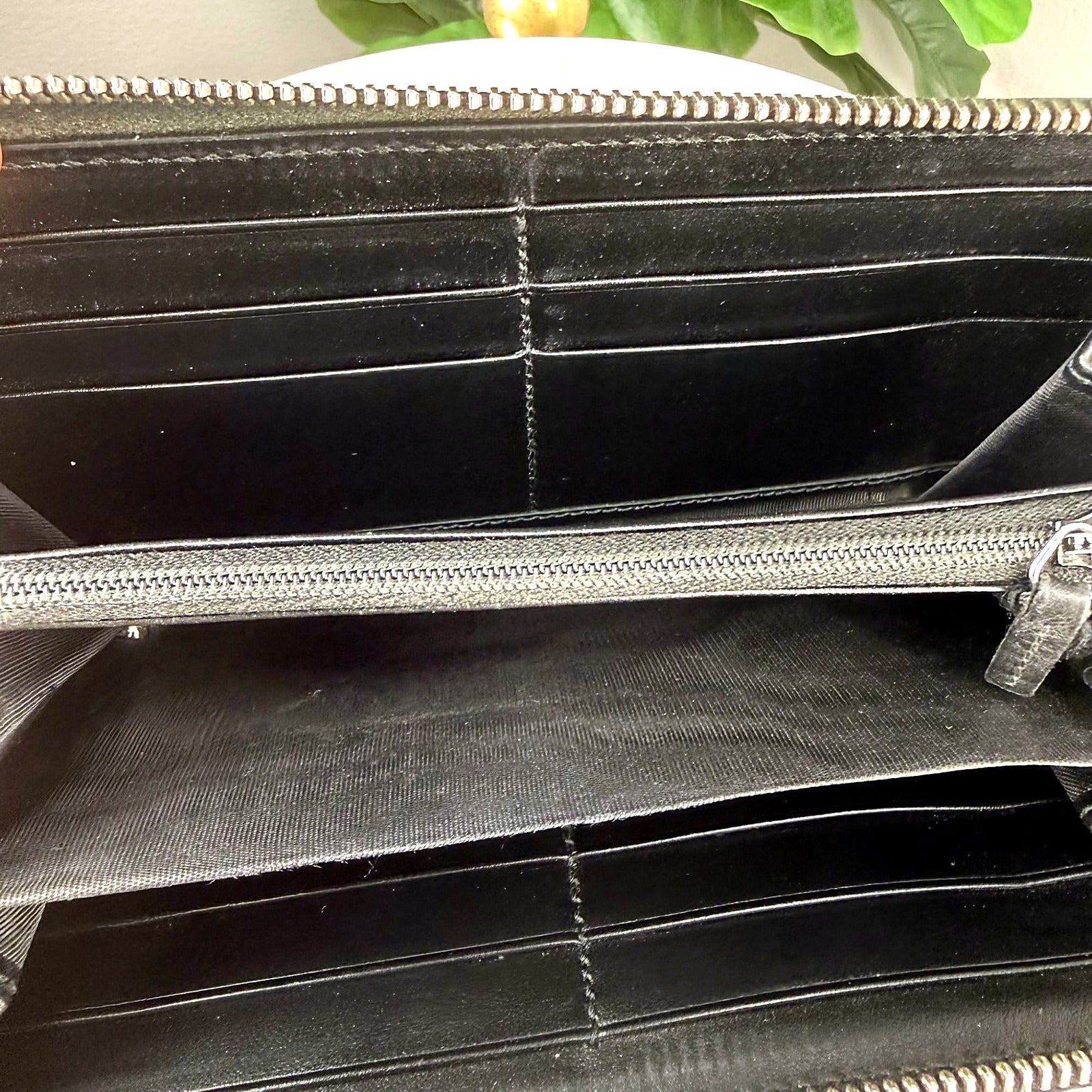 Authentic Gucci GG Embossed Monogram Leather Zip Wallet - single