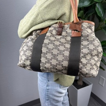 Celine Macadam monogram canvas duffel tote - lifestyle shot worn on shoulder
