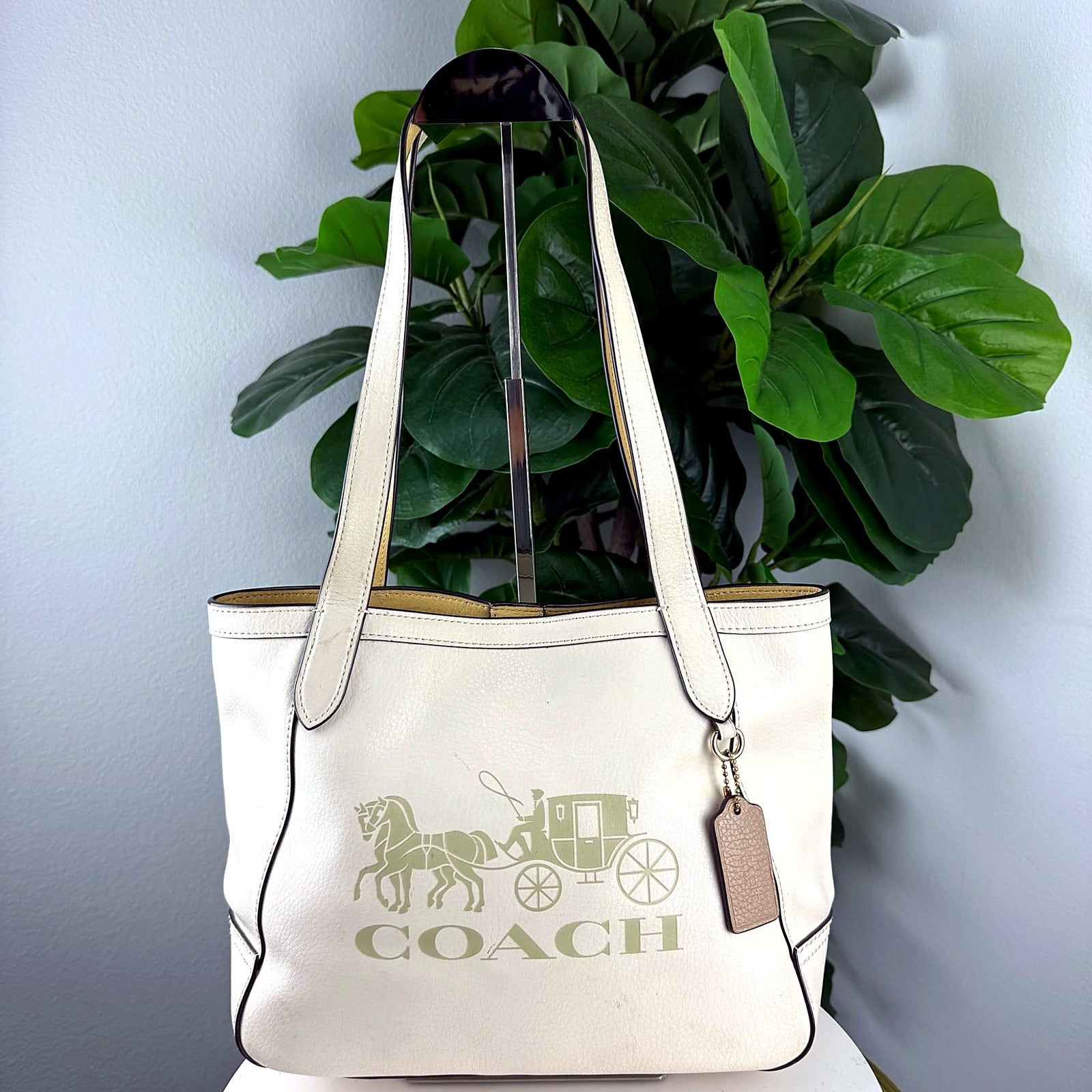 Authentic Coach cream pebbled leather horse and carriage tote - front view