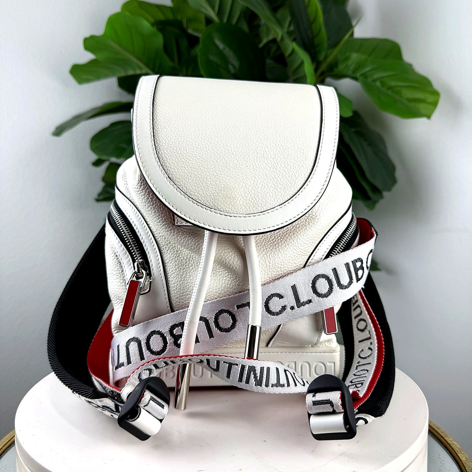 Authentic Christian Louboutin white leather mini convertible backpack - front view