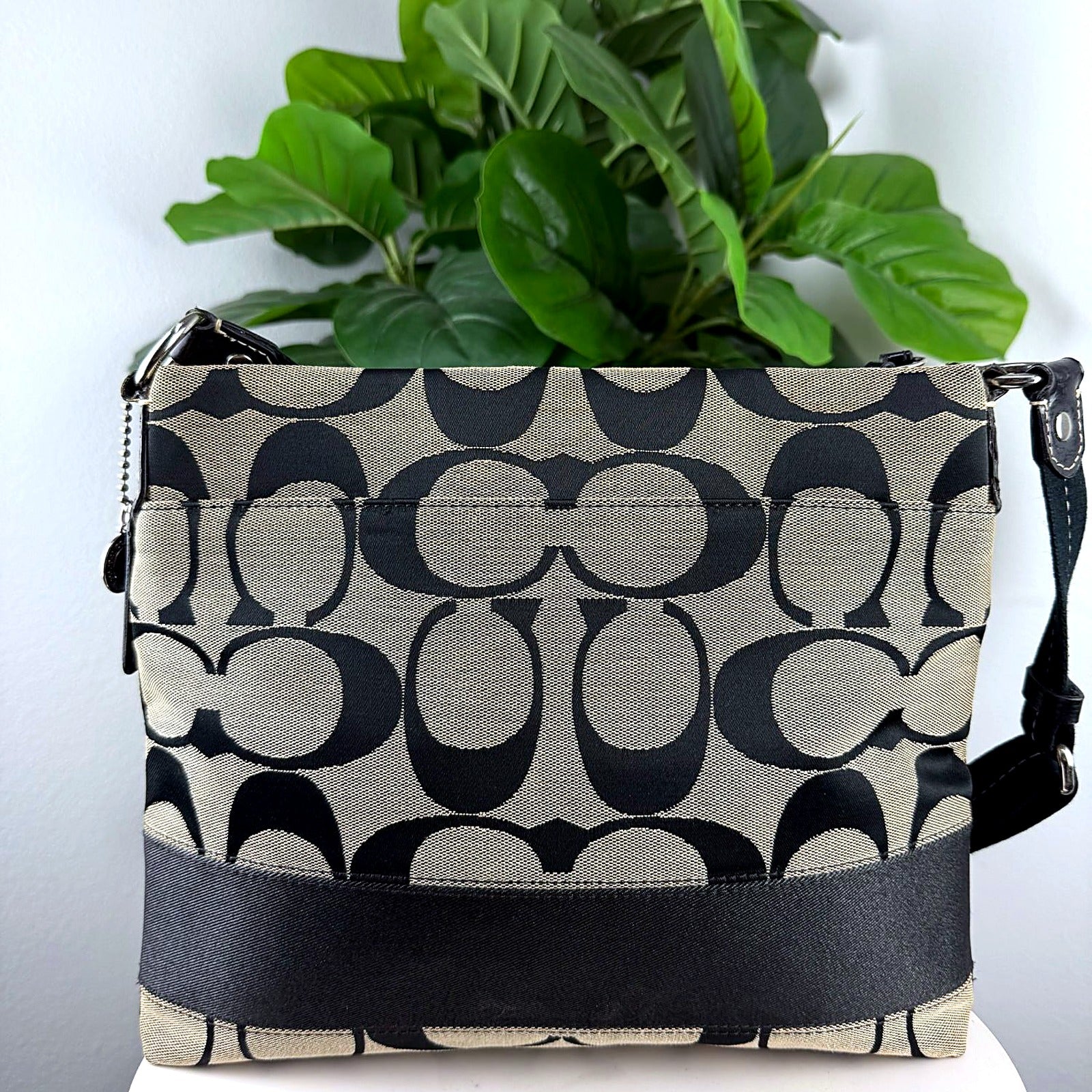 Authentic Coach black tan signature jacquard crossbody swingpack bag back view