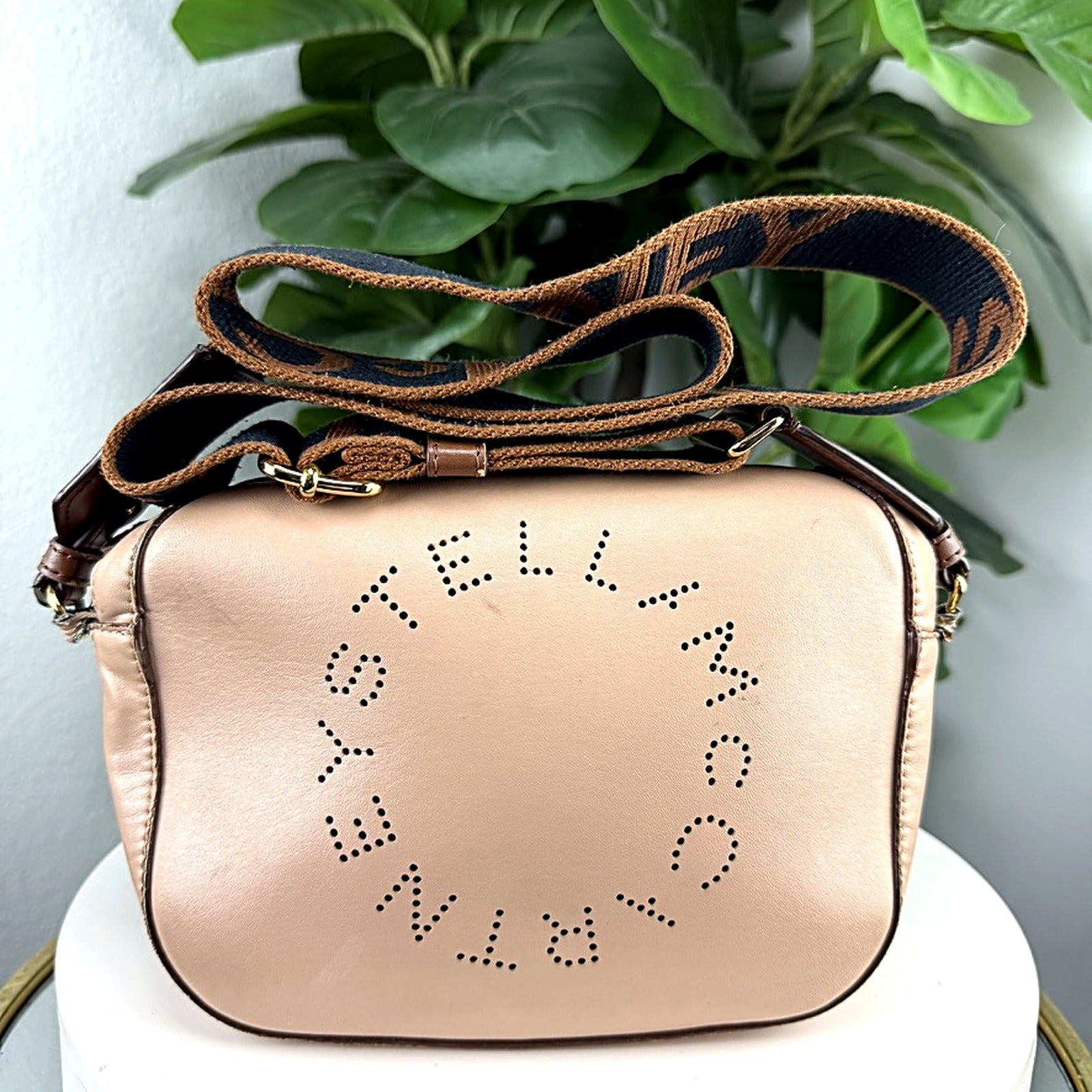 Authentic Stella McCartney blush perforated logo crossbody camera bag - front