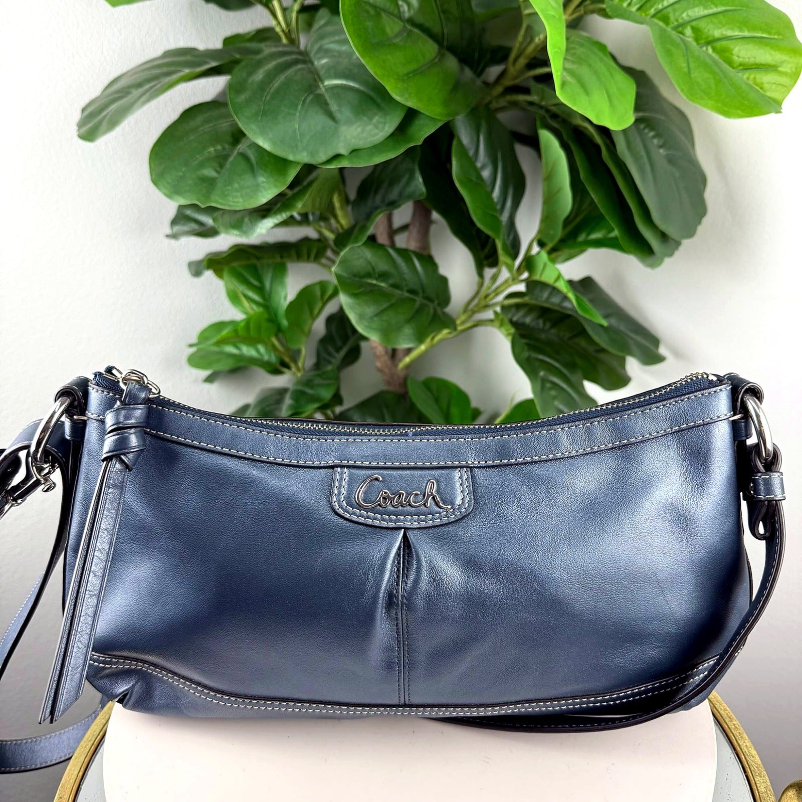 Authentic Coach navy blue leather pleated shoulder bag, front view