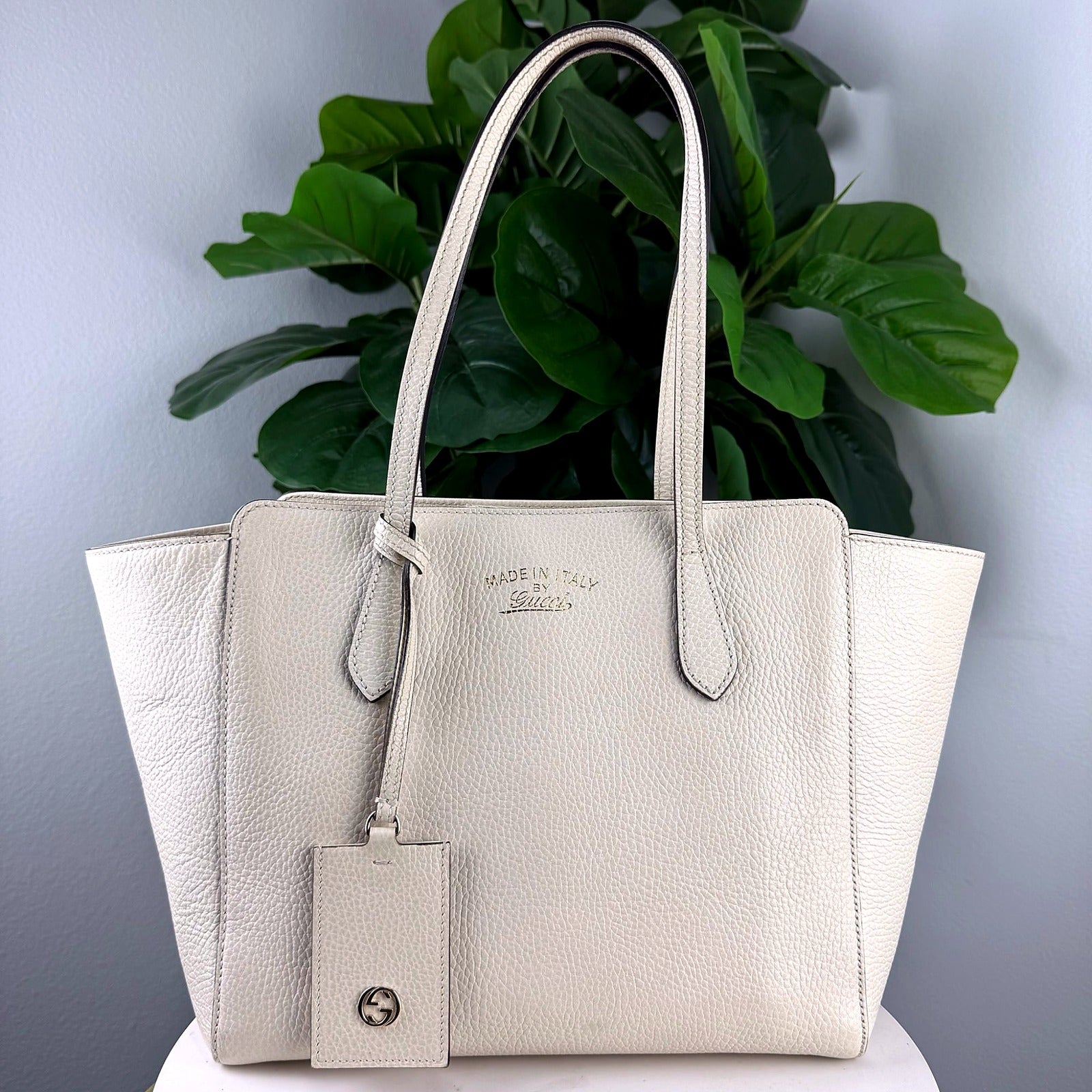 Authentic Gucci Cream Pebbled Leather Swing Tote - front