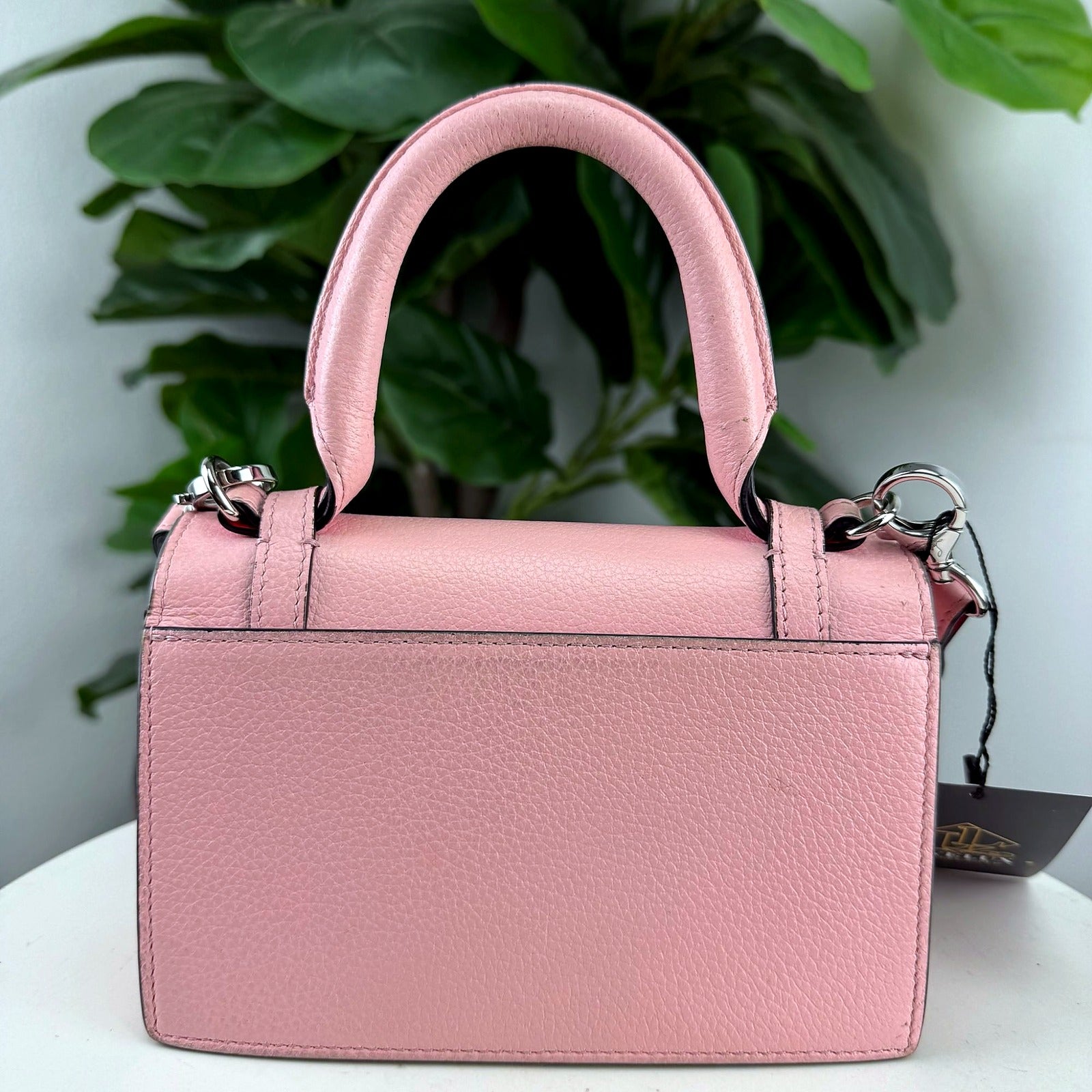 Christian Louboutin pink top handle bag, back view
