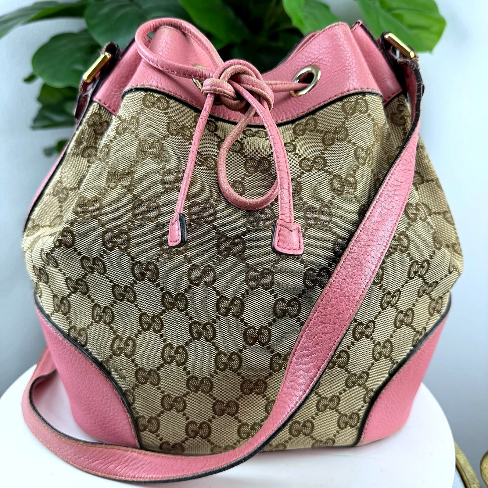 Authentic Gucci GG Monogram Canvas Bucket Bag with Pink Leather Trim - front view