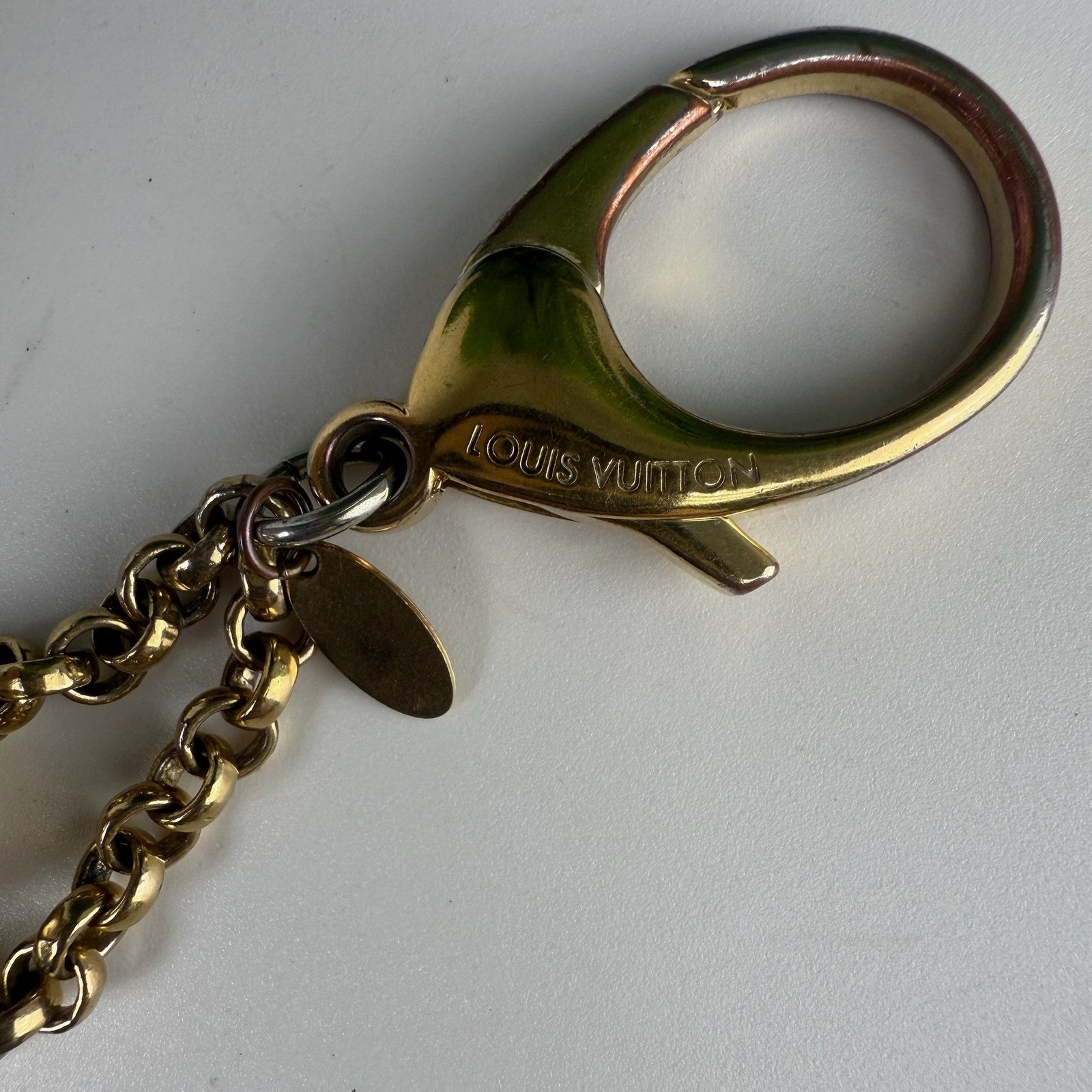 Louis Vuitton engraved lobster clasp close-up